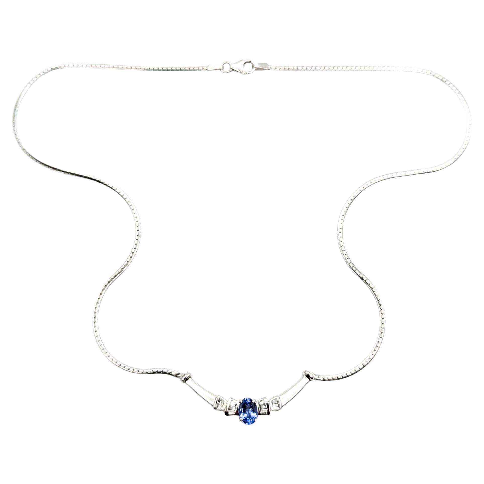 Squisita collana di tanzanite e diamanti in oro bianco 14 carati in vendita
