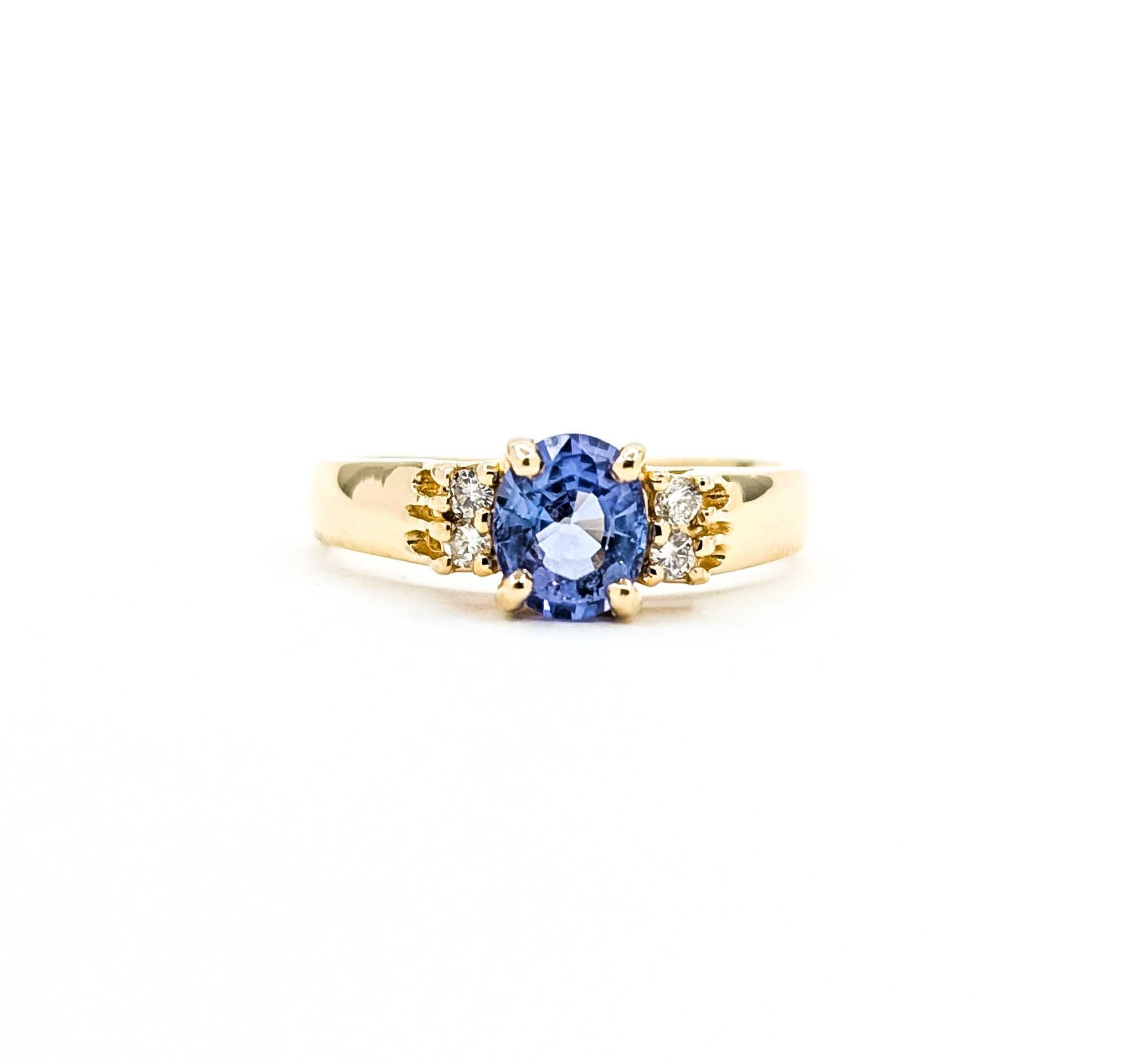 Exquisite Tanzanite and Diamond Ring in 14k Yellow Gold For Sale 4