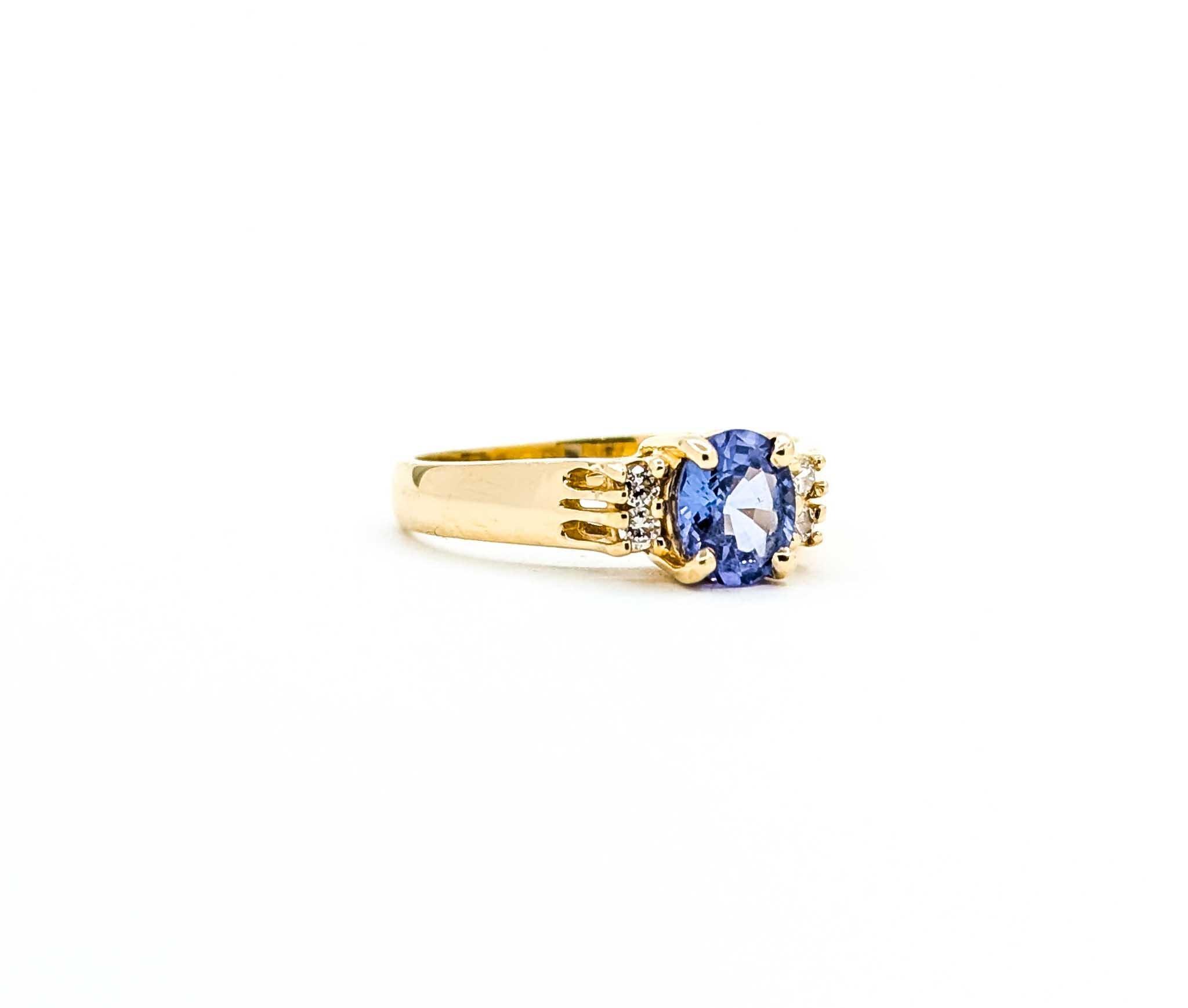 Introducing this beautiful Tanzanite ring crafted in 14k yellow gold. The ring features a captivating .80 carat Tanzanite at its center, accentuated by .04 carats of sparkling diamonds.

The stunning Tanzanite, known for its rich blue-violet color,