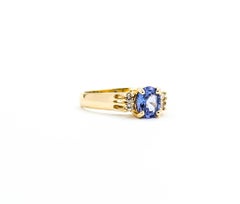 Exquisite Tanzanite and Diamond Ring in 14k Yellow Gold
