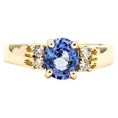 Exquisite Tanzanite and Diamond Ring in 14k Yellow Gold