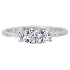 Exquisite Three Stone Ring with Side Diamonds in 18K White Gold