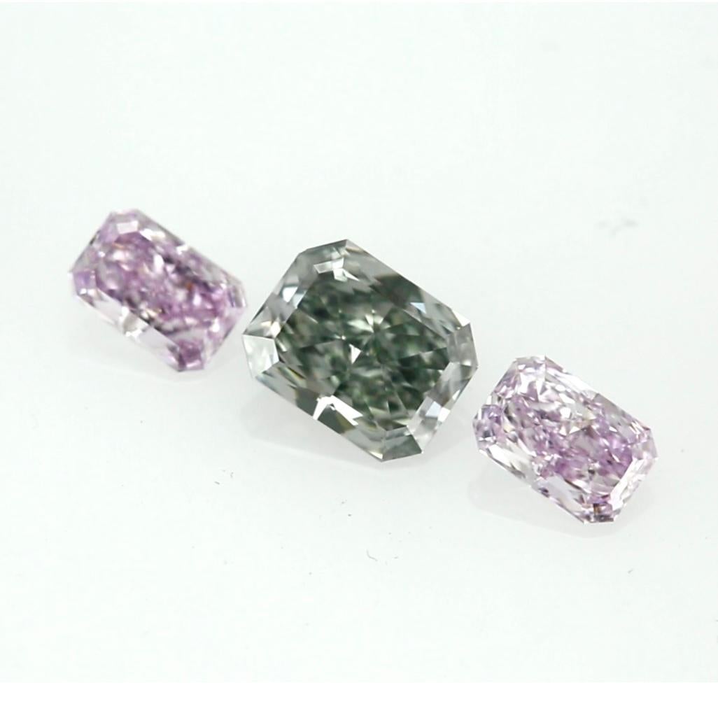 Women's or Men's Exquisite Three-Stone Set Featuring Fancy Blue-Gray & Pinkish Purple Diamonds • For Sale