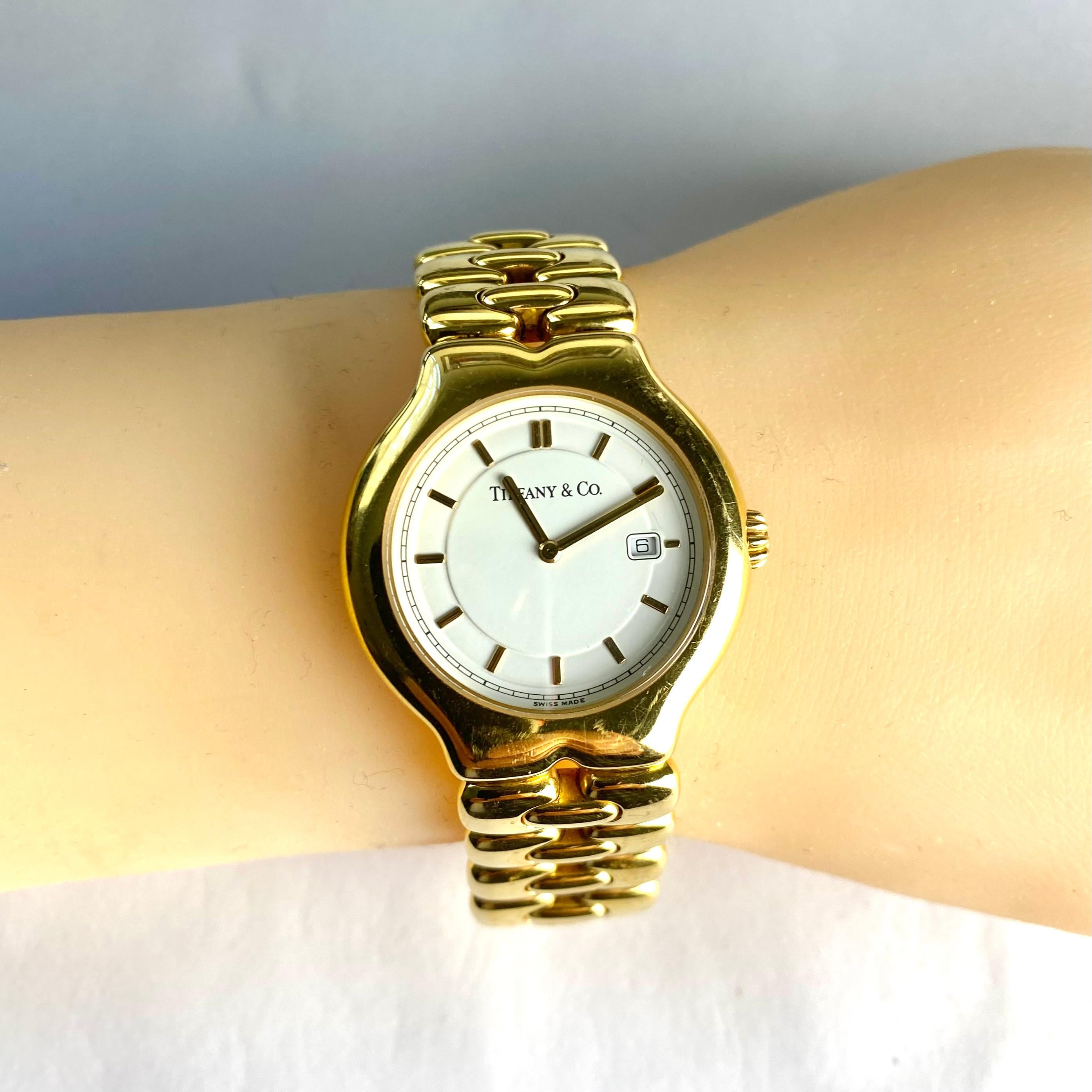 Exquisite Tiffany & Co. Tesoro: 18 Karat Gelbgold schwere Gliederarmbanduhr mit Gliedern Damen