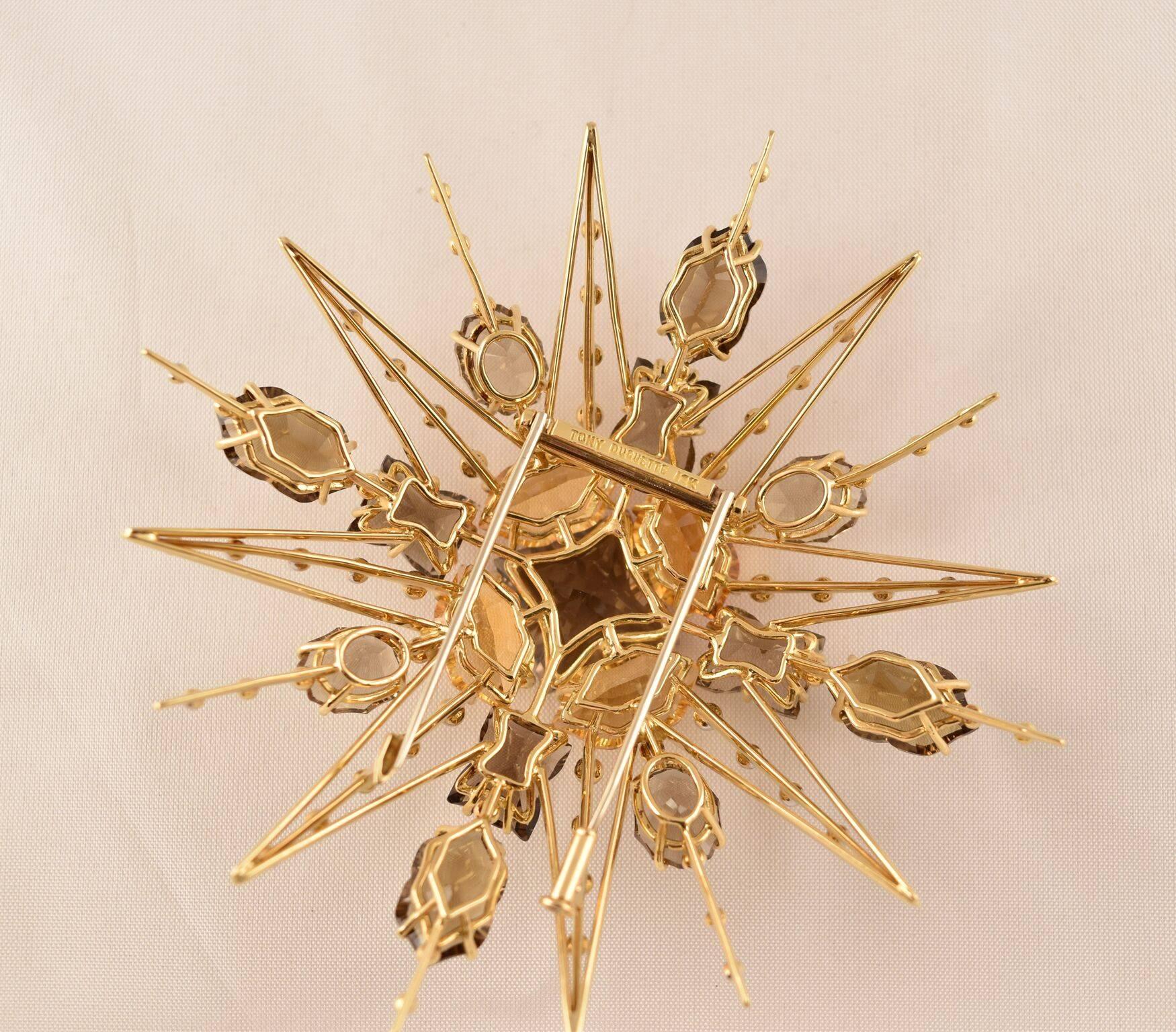 Stunning Citrine, Smoky Quartz and Diamond Statement Brooch, hand crafted in 18k Gold by Tony Duquette, Designer Extraordinaire! Citrine (app. 38 ct.); Smoky Quartz (app. 47ct); Diamond (app. 0.55ct);  3.75” long x 3.75” wide; Signed: TONY DUQUETTE