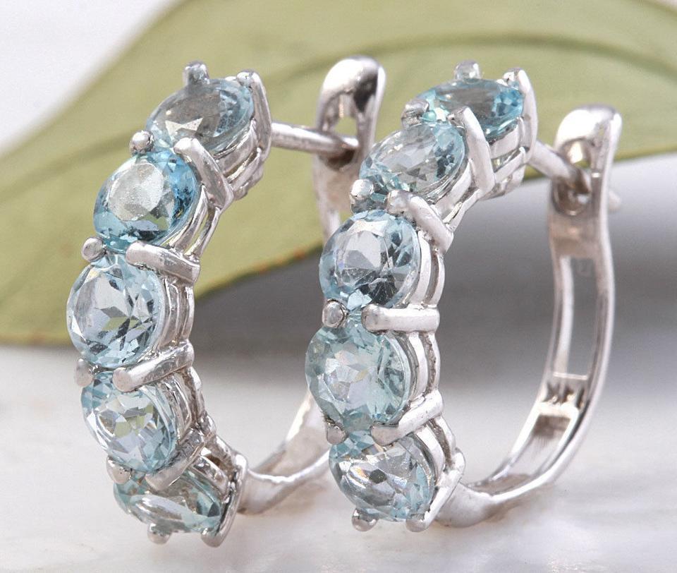 Exquisite Top Quality 2.40 Carats Natural Aquamarine 14K Solid White Gold Huggie Earrings

Amazing looking piece!

Total Natural Round Cut Blue Aquamarines Weight: 2.40 Carats (both earrings)

Aquamarine Measures: 4.2mm

Earring Measures: 17 x