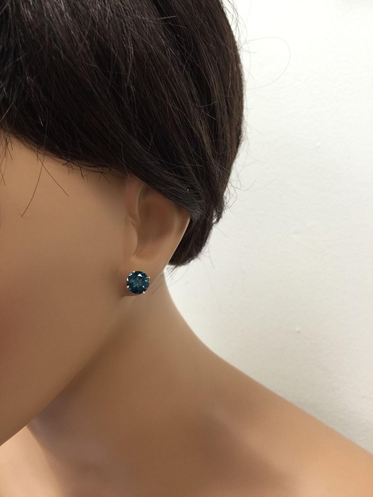 Women's Exquisite Top Quality 4.25 Carat Natural London Blue Topaz 14 Karat Solid Gold For Sale