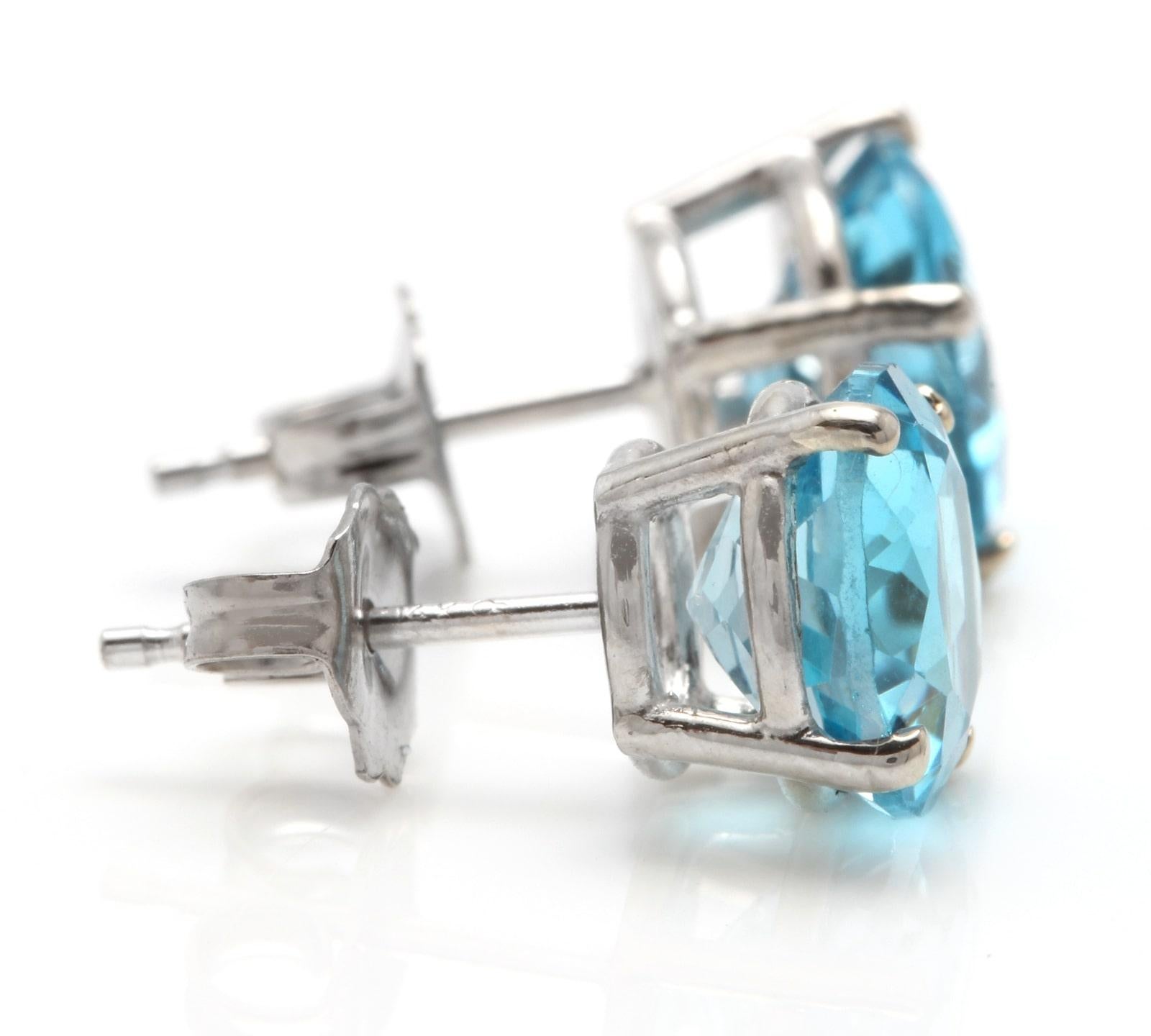 Exquisite Top Quality 4.50 Carats Natural Swiss Blue Topaz 14K Solid White Gold Stud Earrings

Amazing looking piece!

Total Natural Round Cut Swiss Blue Topaz Weight: 4.50 Carats (both earrings)

Topaz Treatment: Heating, Irradiation

Swiss Blue