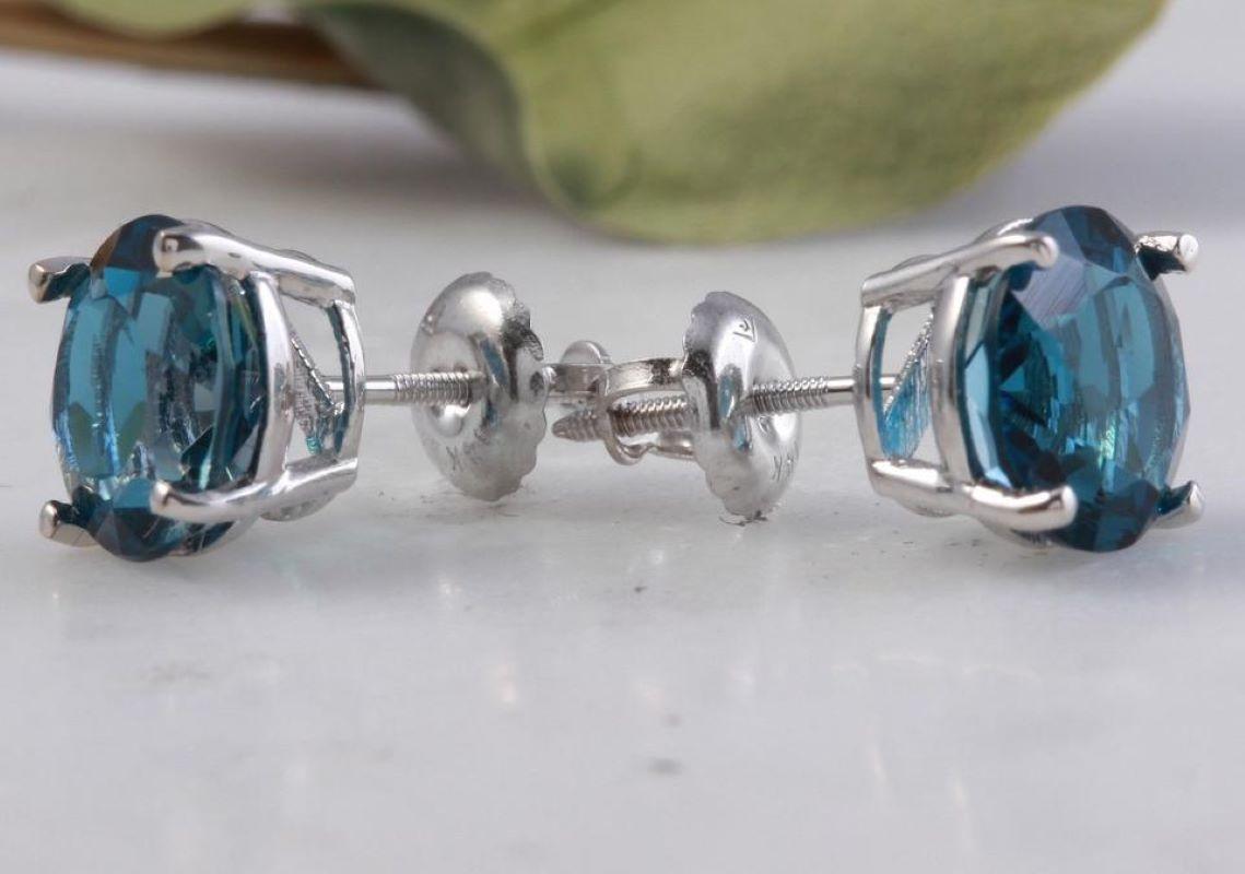 Exquisite Top Quality 4.50 Carats Natural London Blue Topaz 14K Solid White Gold Stud Earrings

Amazing looking piece!

Total Natural Round Cut London Blue Topaz Weight: 4.50 Carats (both earrings)

Topaz Treatment: Heating, Irradiation

London Blue