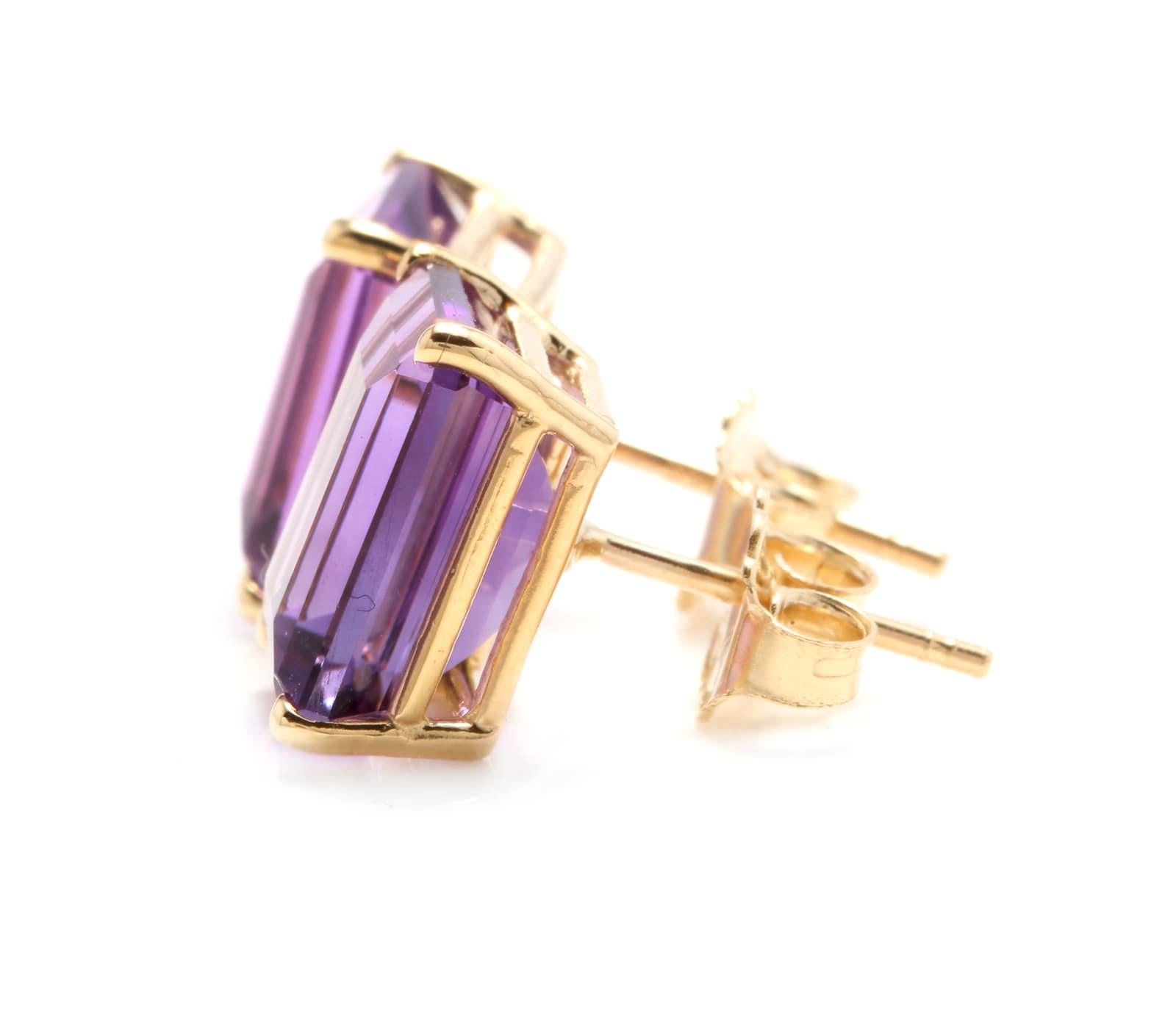 Exquisite Top Quality 7.45 Carats Natural Amethyst 14K Solid Yellow Gold Stud Earrings

Amazing looking piece!

Total Natural Emerald Cut Amethyst Weight is: 7.45 Carats (both earrings)

Amethyst Measures: Approx. 10.00 x 8.00mm

Total Earrings