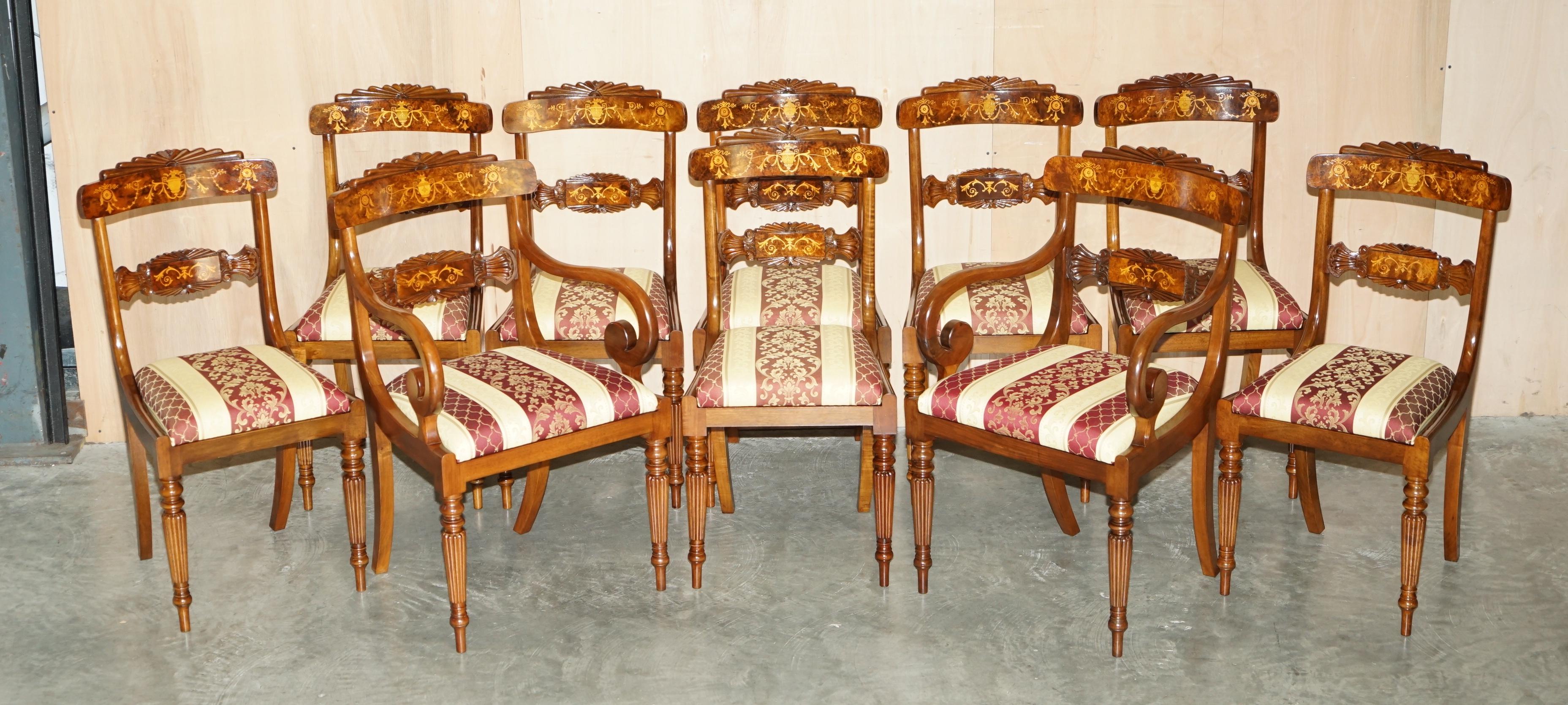 Royal House Antiques

Royal House Antiques freut sich, diesen absolut exquisiten Esstisch im Regency-Stil mit zwei Sockeln aus Wurzelnussholz und zehn dazu passenden Stühlen mit Intarsien, die kunstvoll geschnitzte Rahmen haben, zum Verkauf