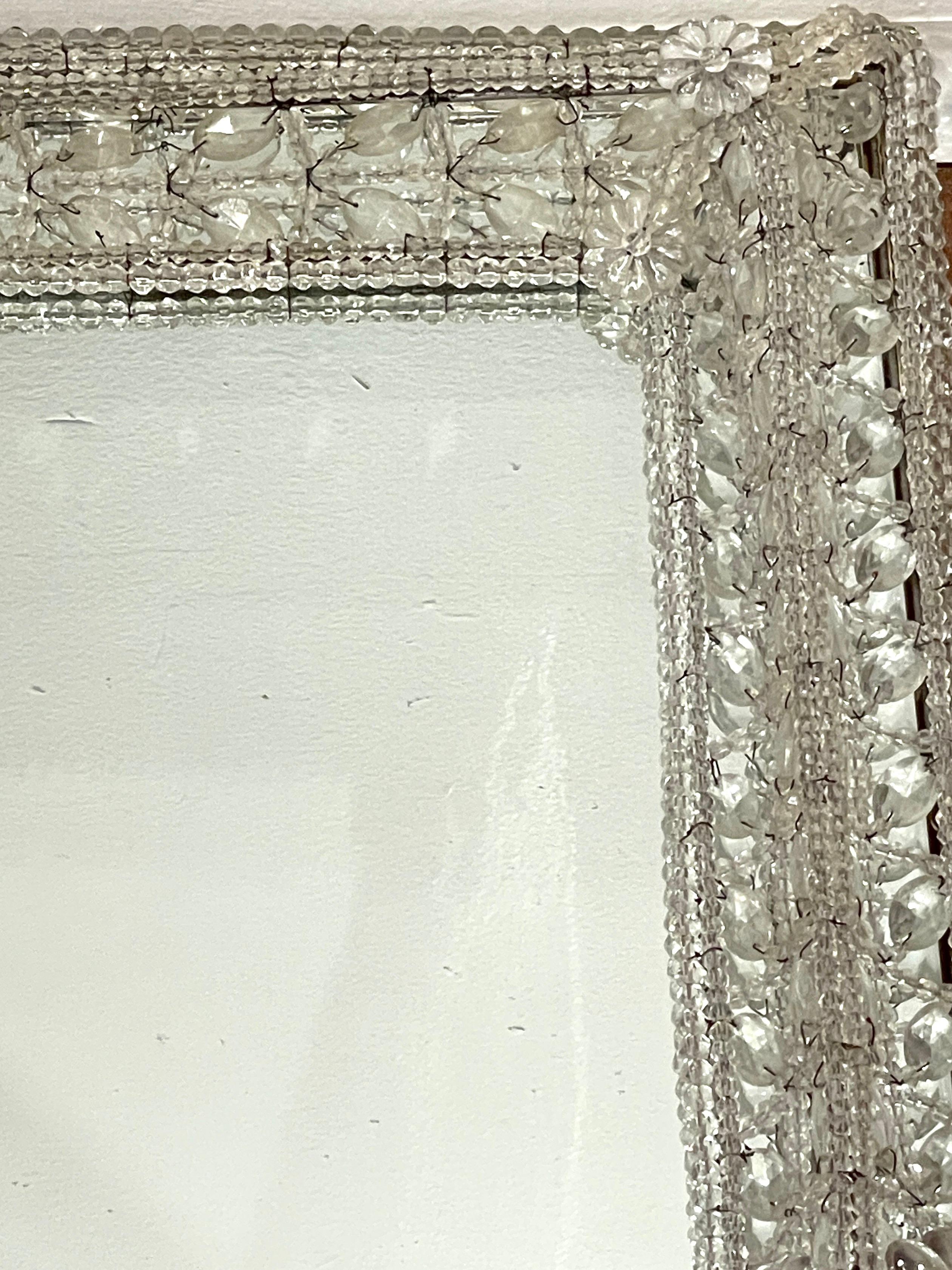 Exquisite Venetian Beaded Crystal Mirror, Of rectangular form with continuous intricate raised Venetian crystal surround, with inset 17.5-Inch wide x 25-Inch high mirror. 

