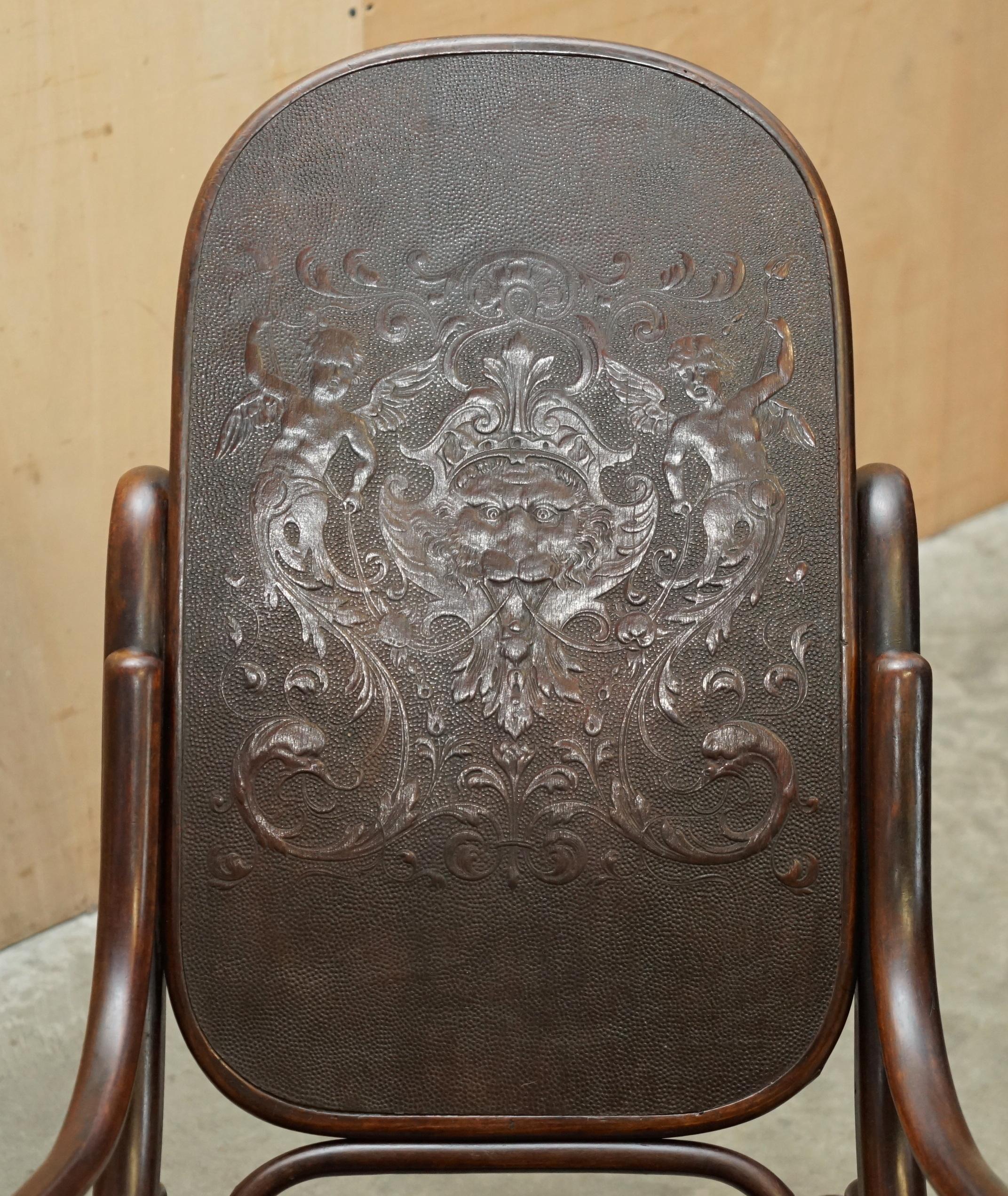 Hand-Crafted EXQUISITE ViCTORIAN THONET ROCKING CHAIR WITH CHERUB CARVED BACK & SEAT PANELS For Sale
