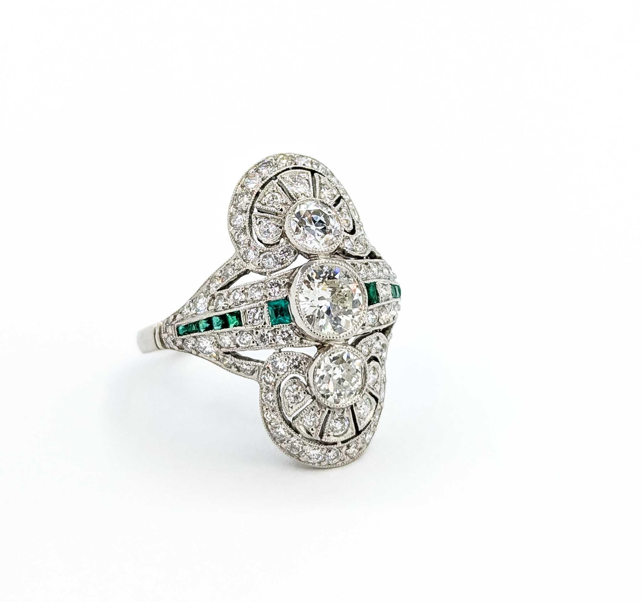 Exquisite Vintage Diamond and Emerald Cocktail Shield Ring in 900pt Gold

Introducing this exquisite vintage ring, crafted in luxurious 900pt gold. This cocktail shield ring showcases a stunning array of gemstones, featuring 1.15 carats of