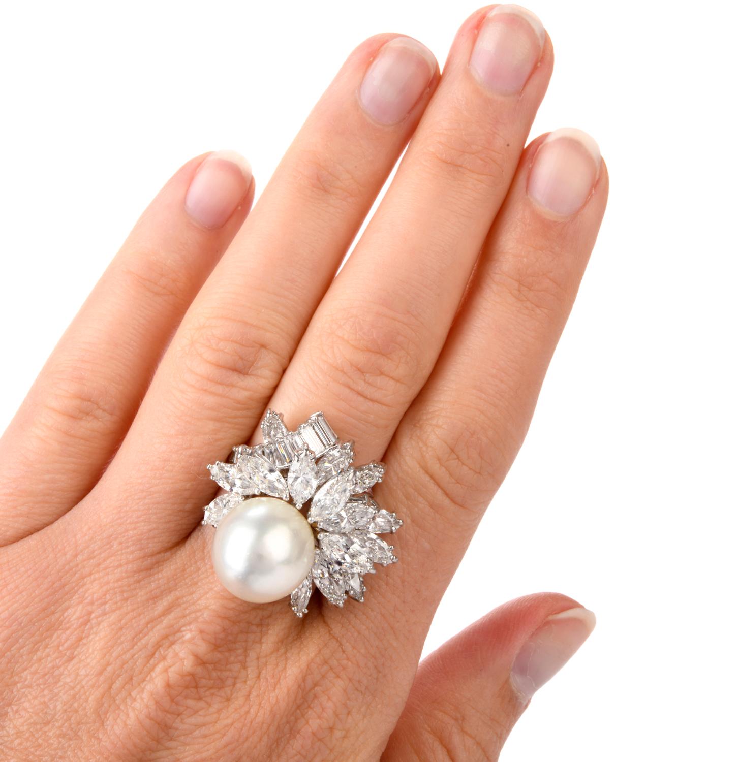 This Extraordinary Gem will Delight in White! This is the perfect compliment to 'The Little Black Dress'.

Front and center is a beautiful soft white 13.5mm Pearl with heightened luster.  Wrapping around the end of the Pearl are 15 beautifully