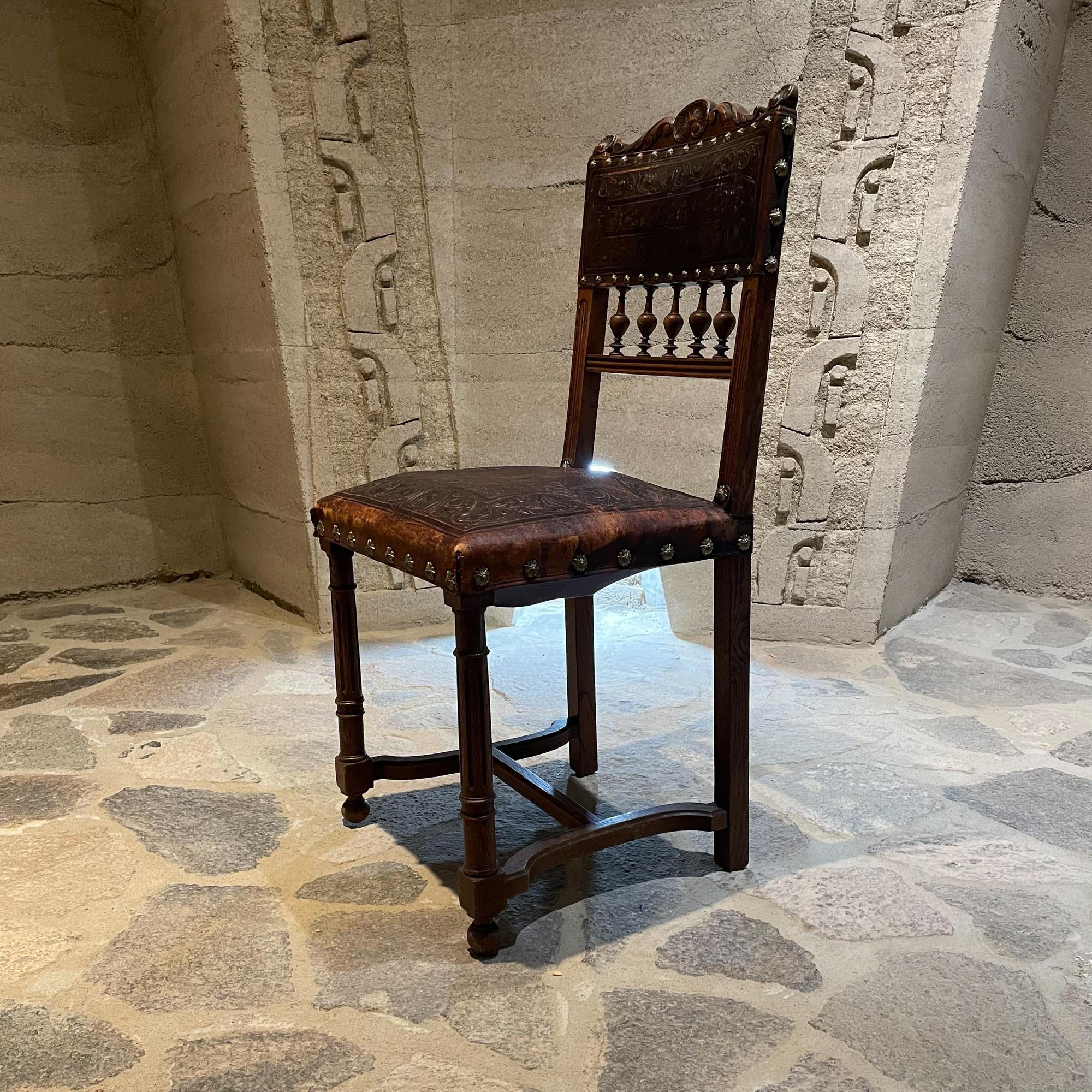 Antique Victorian Dining Chairs Set of Six 1880s Henri II period.
Featuring French Tiger Oak Original Embossed Leather-Horsehair-Spring Seats-decorative Brass tacks and Lion Feet.
Paris 1878 Fabrique de Clous Dores label present. 
Label -paper