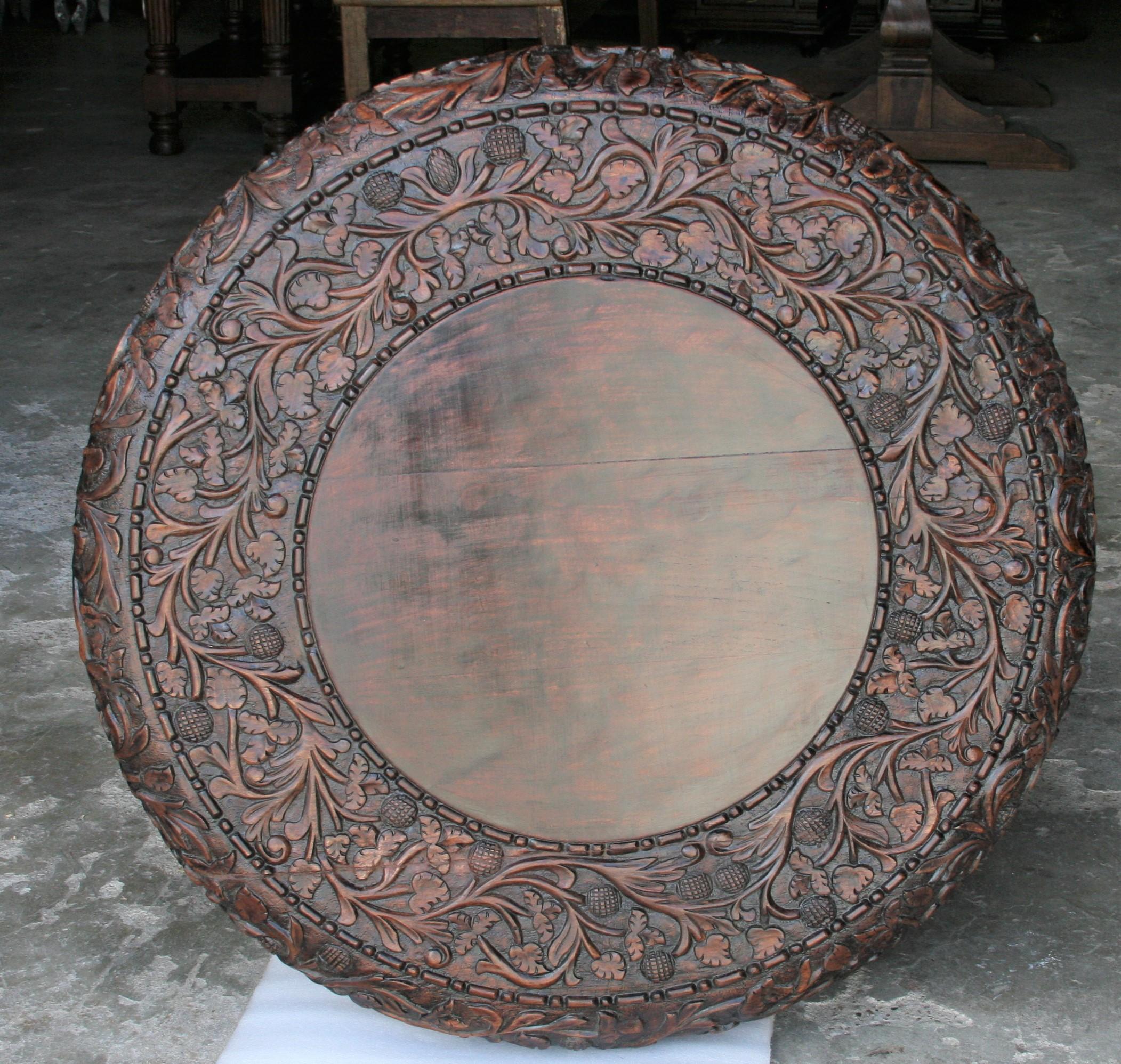 Early 20th Century Exquisitely Carved Solid Teak Wood Round Center Table from a Colonial Mansion For Sale