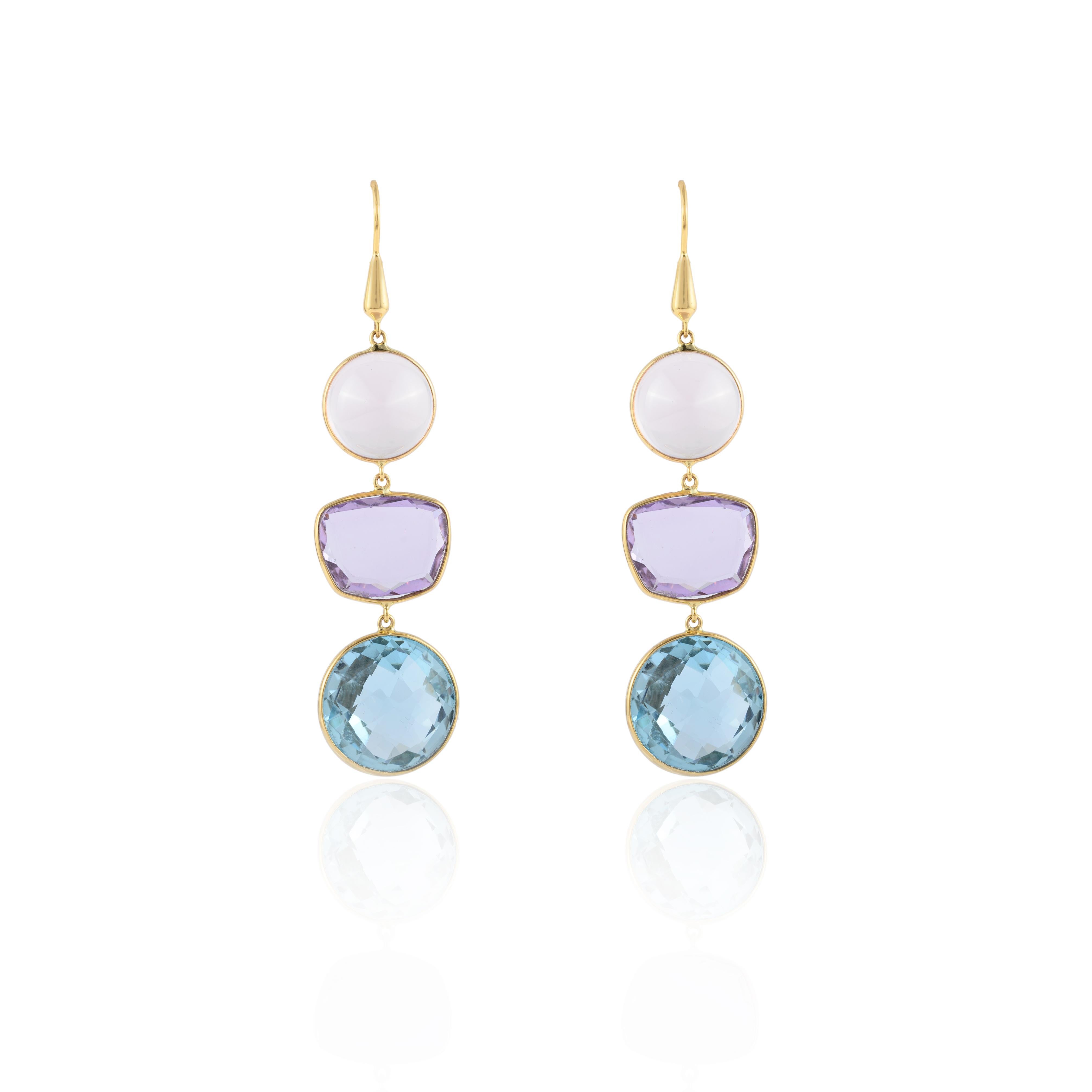 Handmade Multi Stone Earrings in 14K gold to make a statement with your look. These earrings create a sparkling, luxurious look featuring uneven cut semi precious gemstones.
Designed with different cut stones hanged vertically one after other