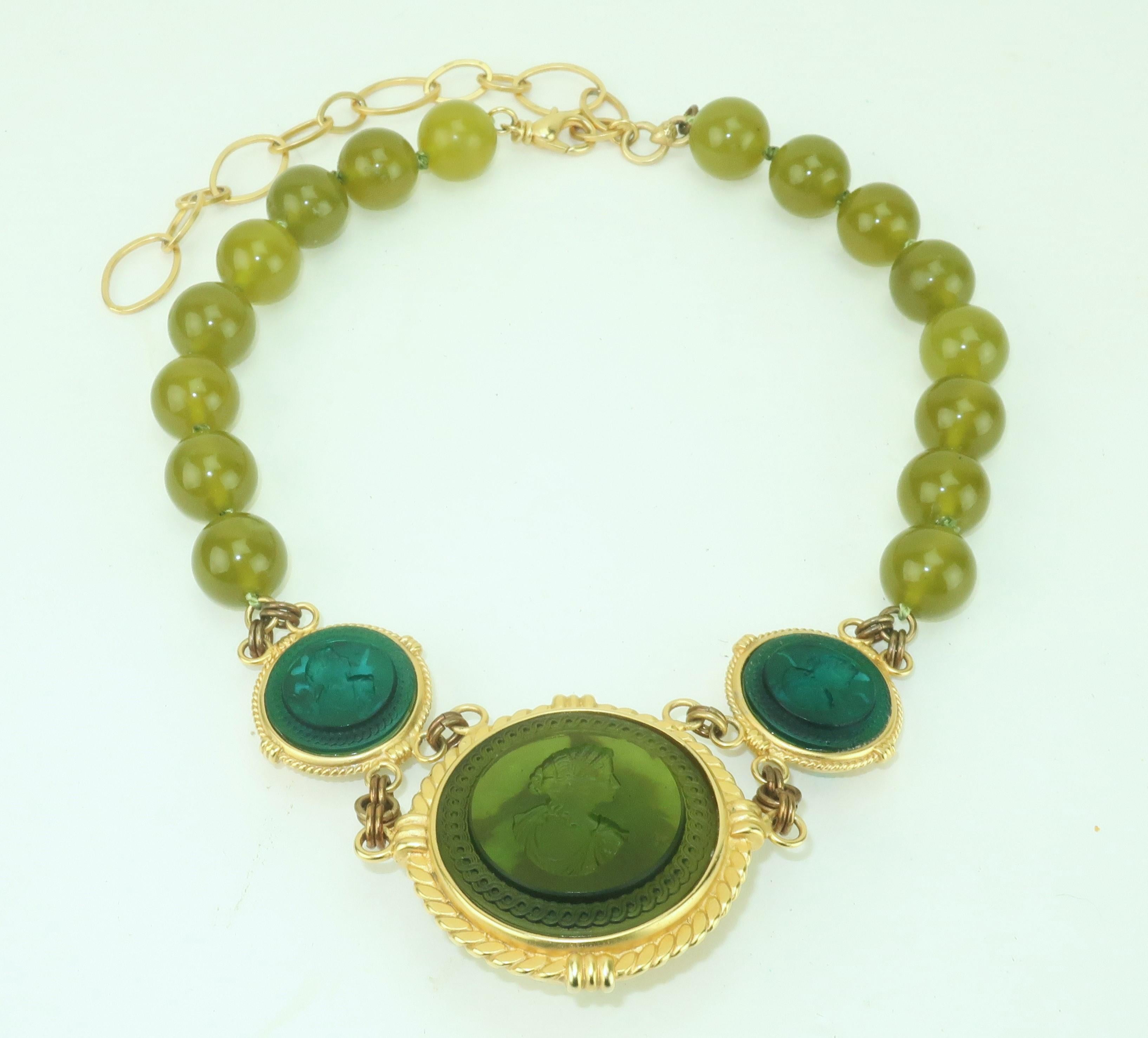 1990’s Extasia of California Victorian inspired necklace composed of glass intaglios in gold plated settings.  The beautiful classical design incorporates the dying art of pressed glass that Extasia’s founder and designer, Stefanie Freydont, imports