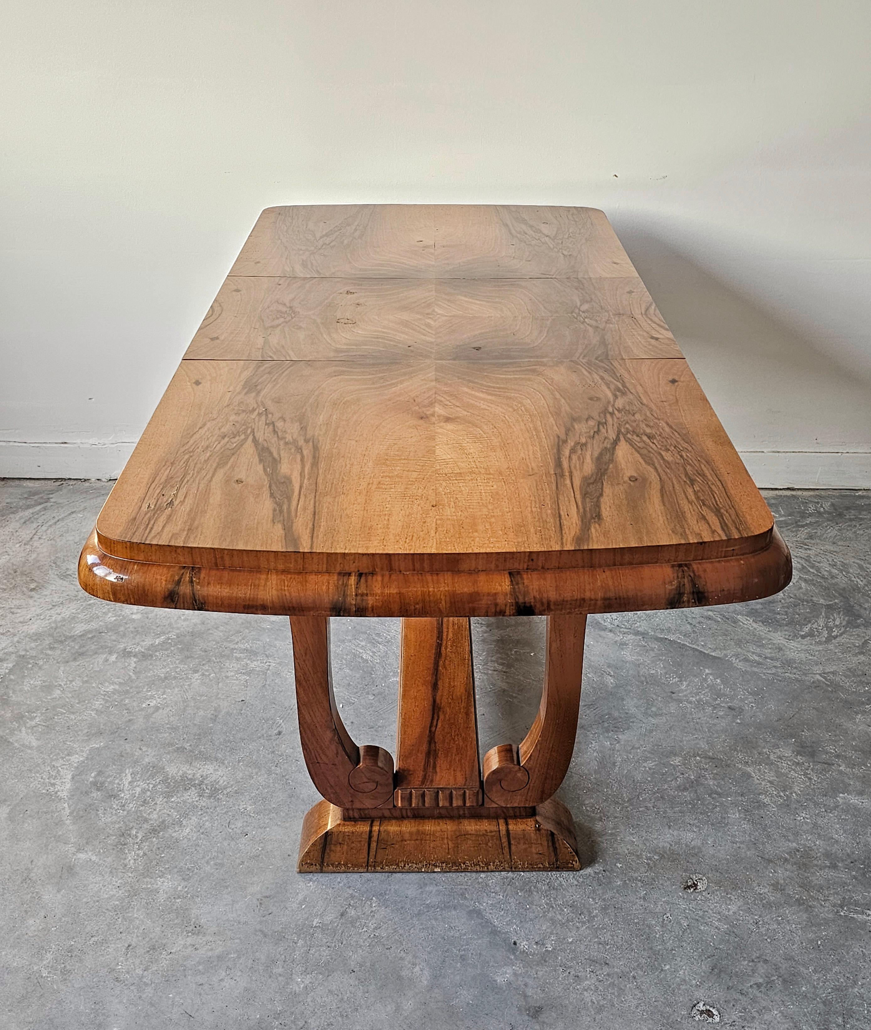 Extendable Art Deco dining table with harp-shade legs done in walnut root veneer For Sale 9