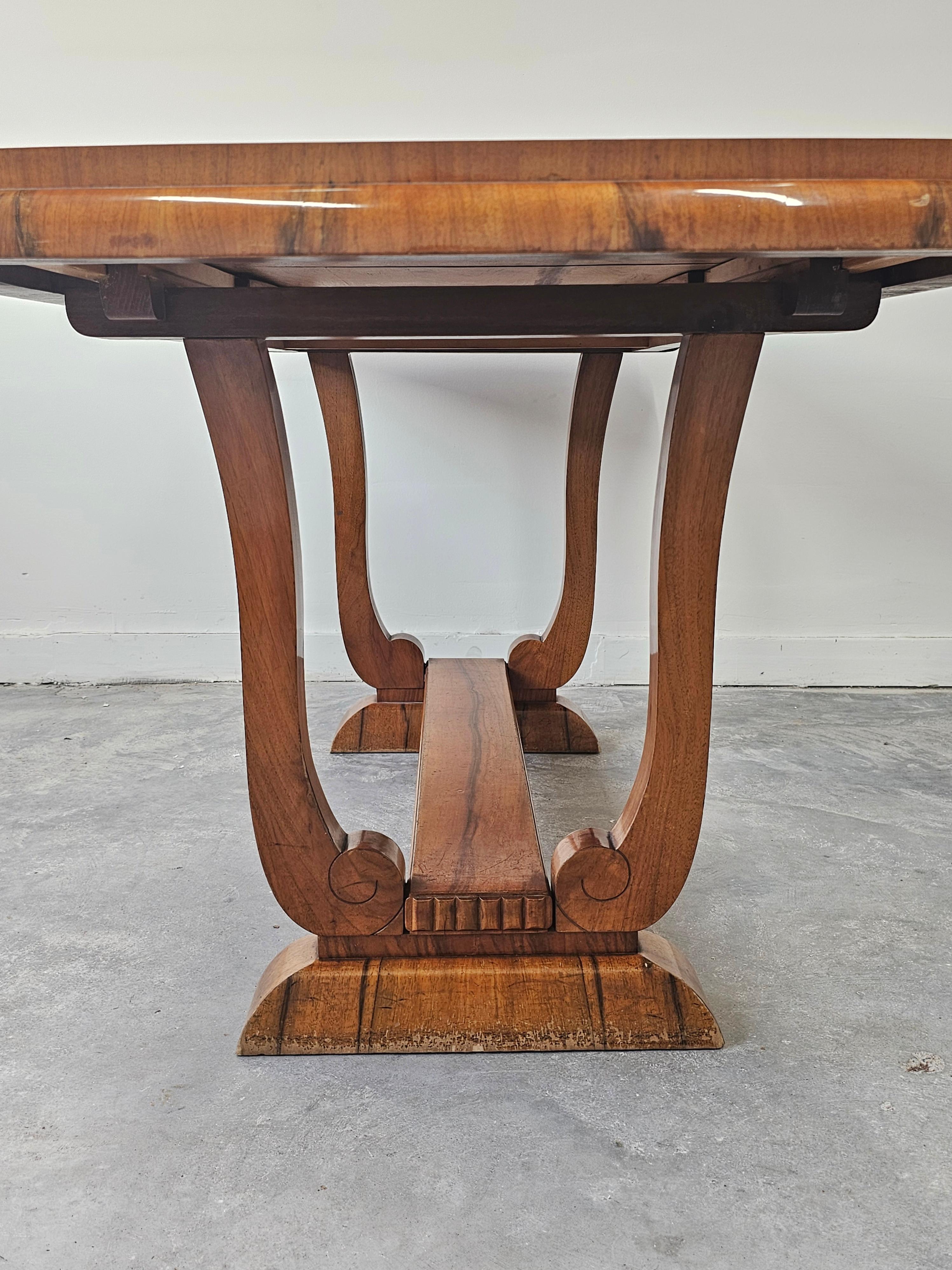 Extendable Art Deco dining table with harp-shade legs done in walnut root veneer For Sale 12