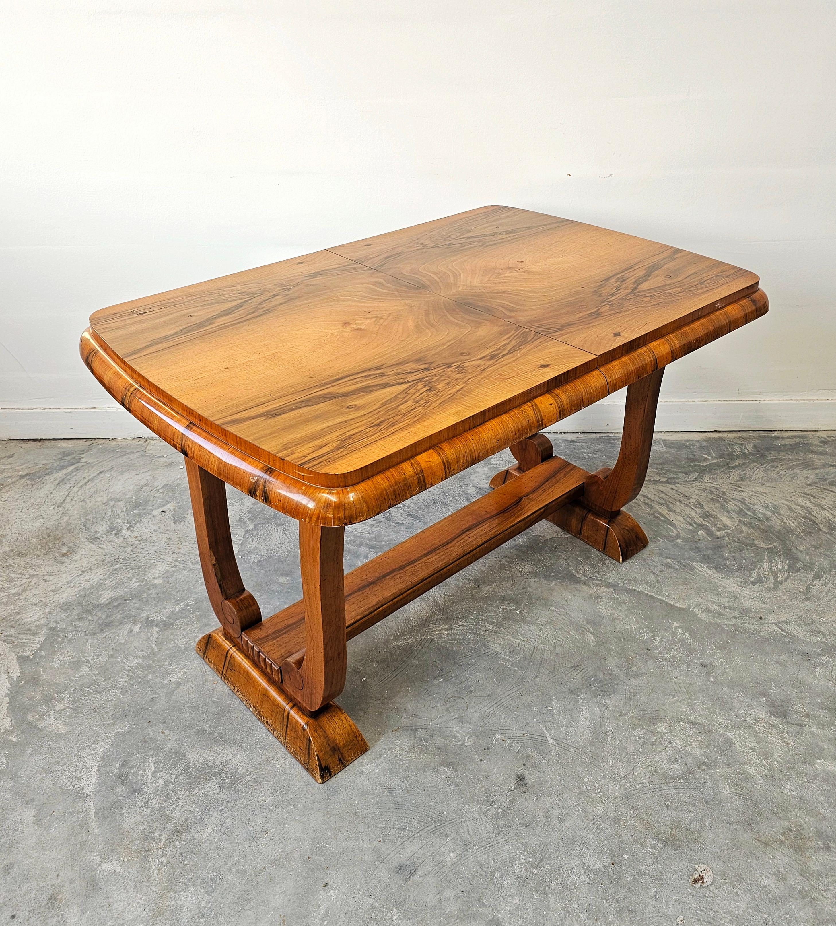 Mid-20th Century Extendable Art Deco dining table with harp-shade legs done in walnut root veneer For Sale