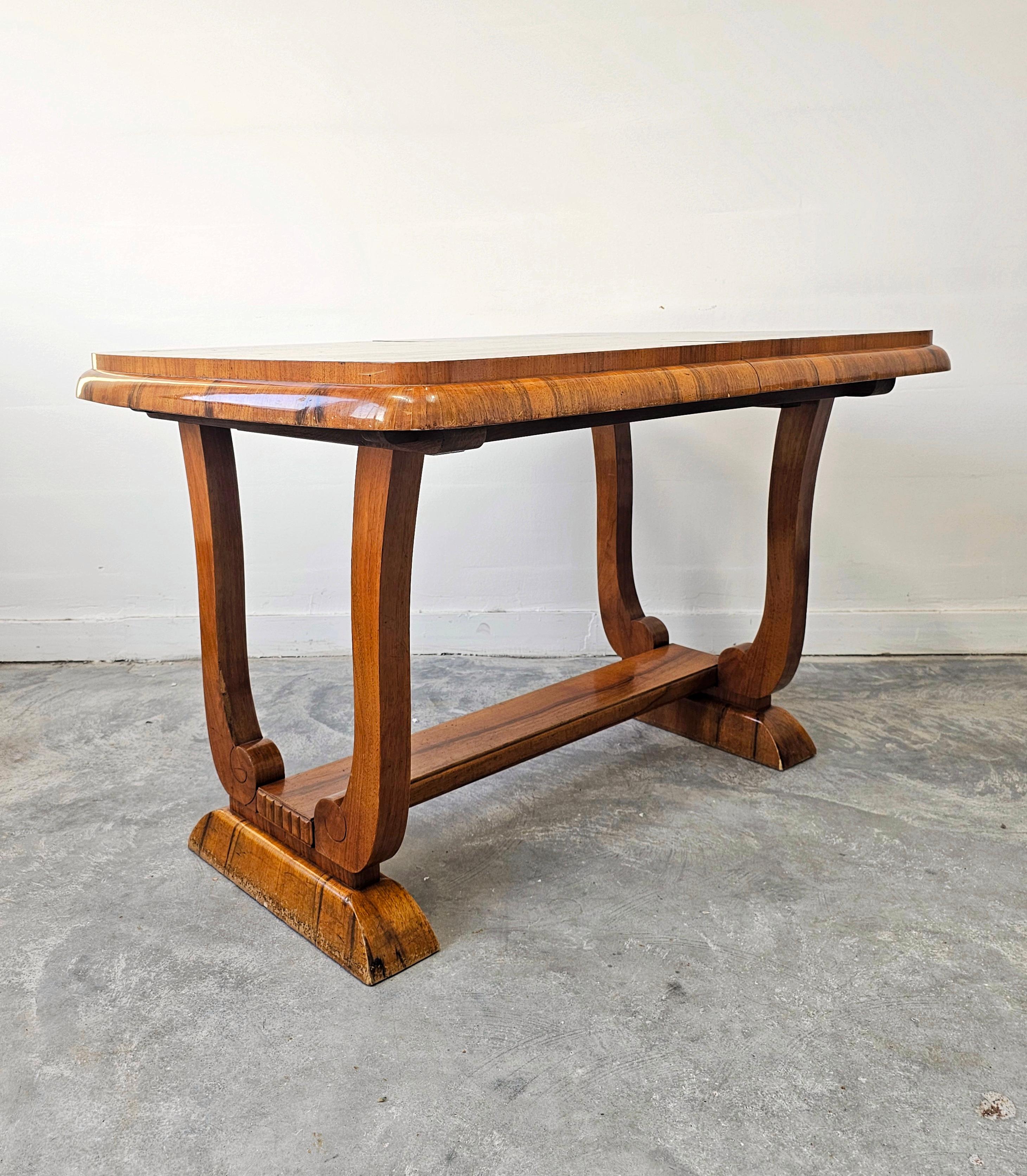 Walnut Extendable Art Deco dining table with harp-shade legs done in walnut root veneer For Sale