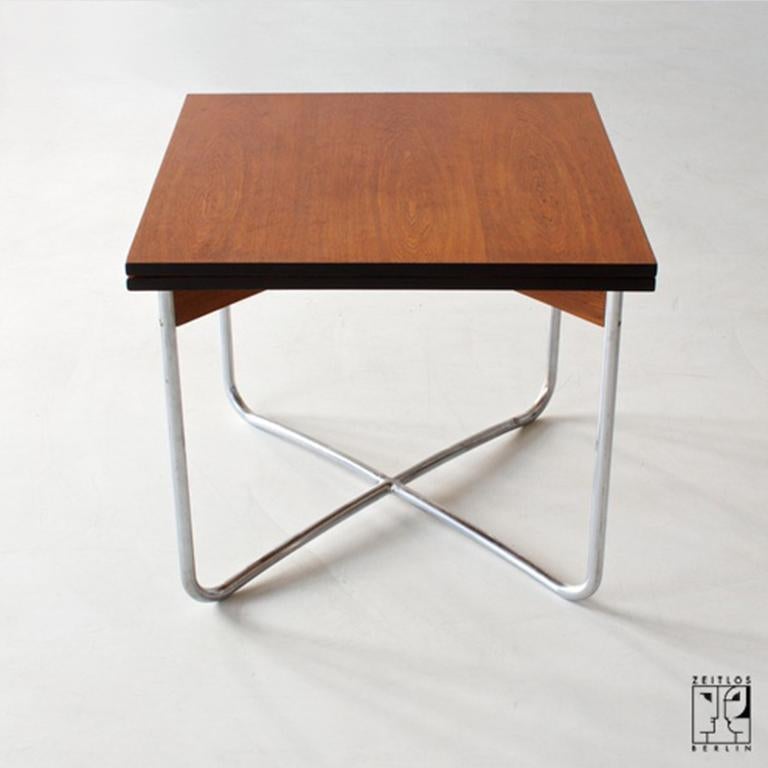Lacquered Extendable Bauhaus dining table made of tubular steel and veneered table tops For Sale