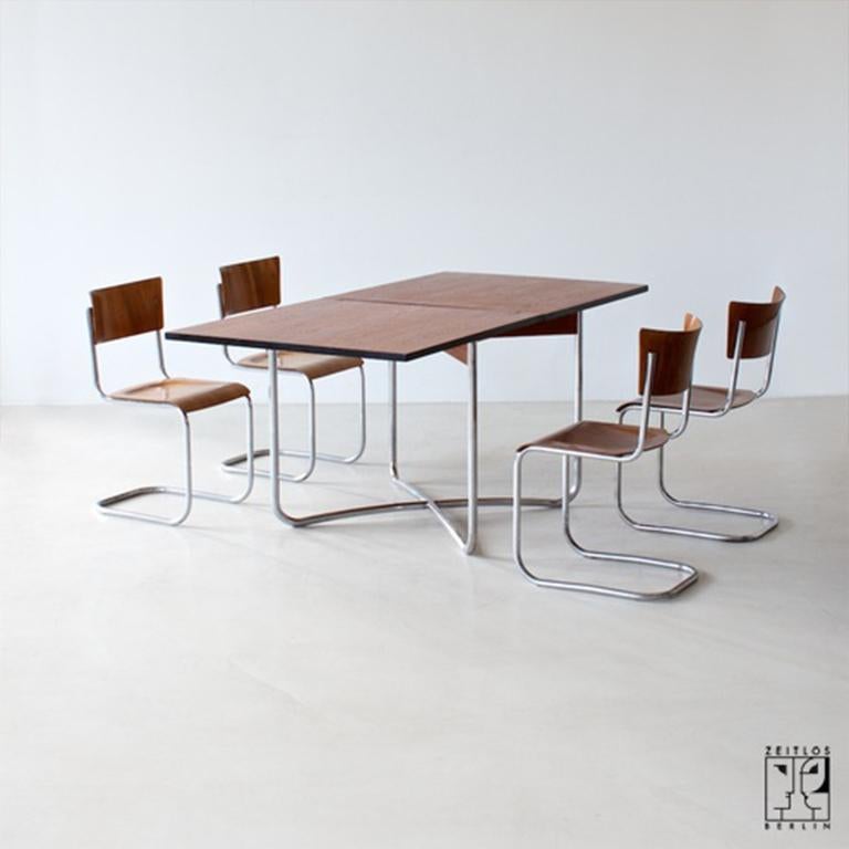 Steel Extendable Bauhaus dining table made of tubular steel and veneered table tops For Sale