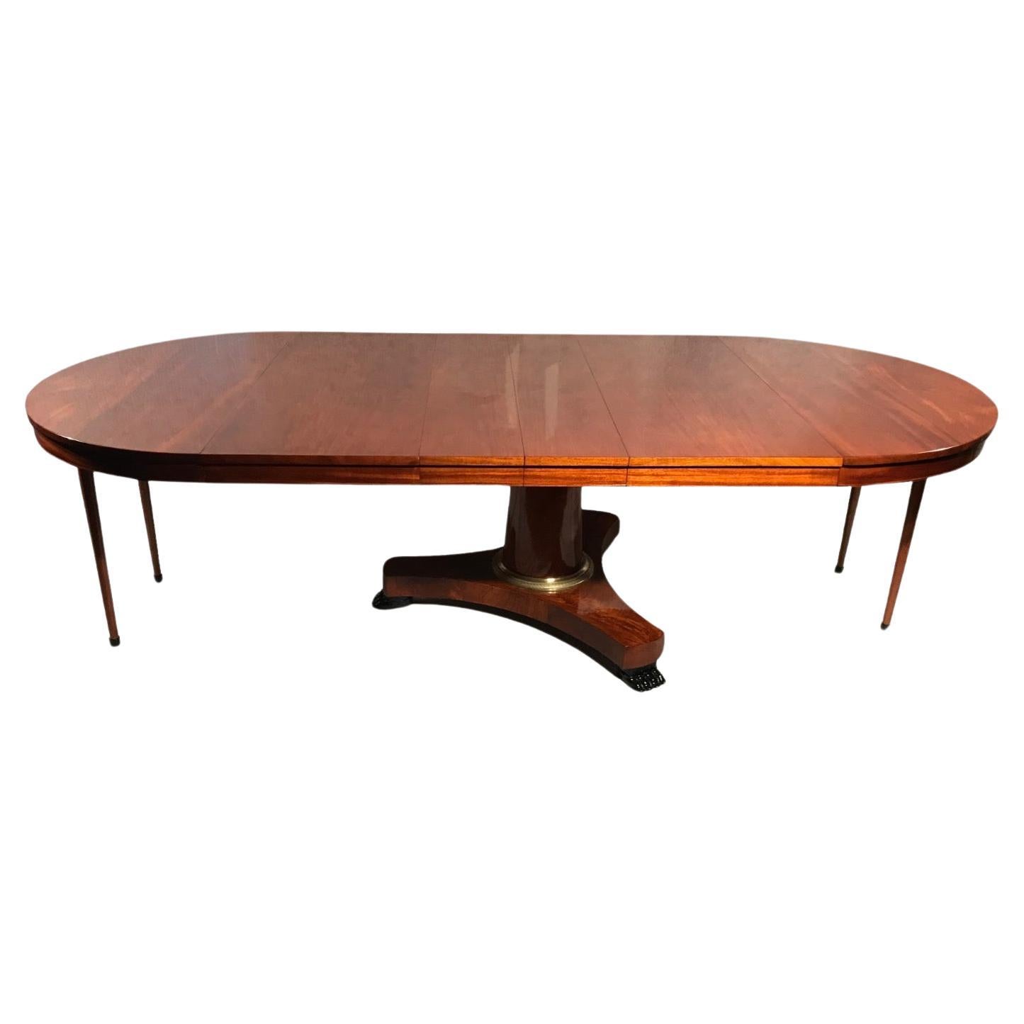 This exquisite Biedermeier/French Restauration Table, dating back to 1830 and originating from France, is a true gem for those with a taste for classic elegance. The table features a round design, with a central column gracefully resting on a