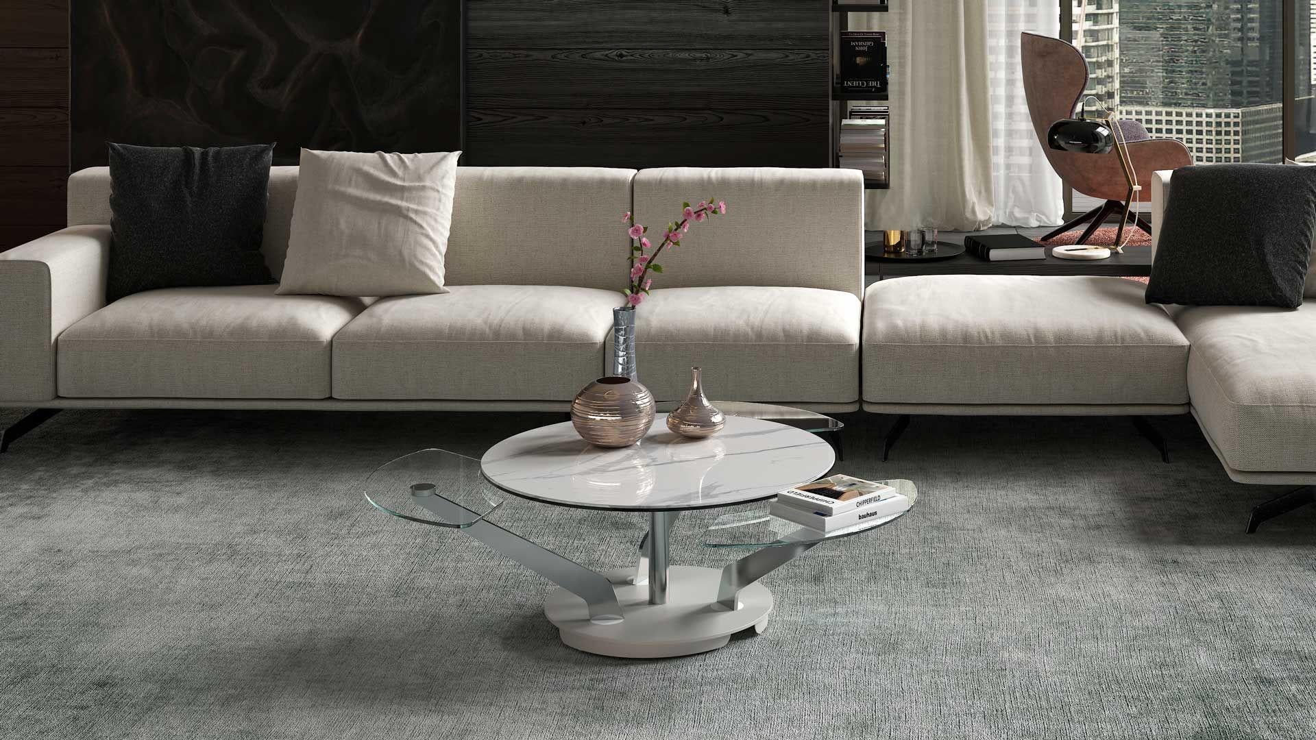 BLOSSOM - Extendable Coffee Table
Design: A. Casati

The Blossom coffee table is a versatile and innovative piece, combining functional design with contemporary elegance. Its unique 360° rotation mechanism allows the three lower tops to open