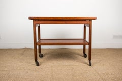 Extendable Danish rolling table with two levels, in teak, 1960 by Kurt Ostervig