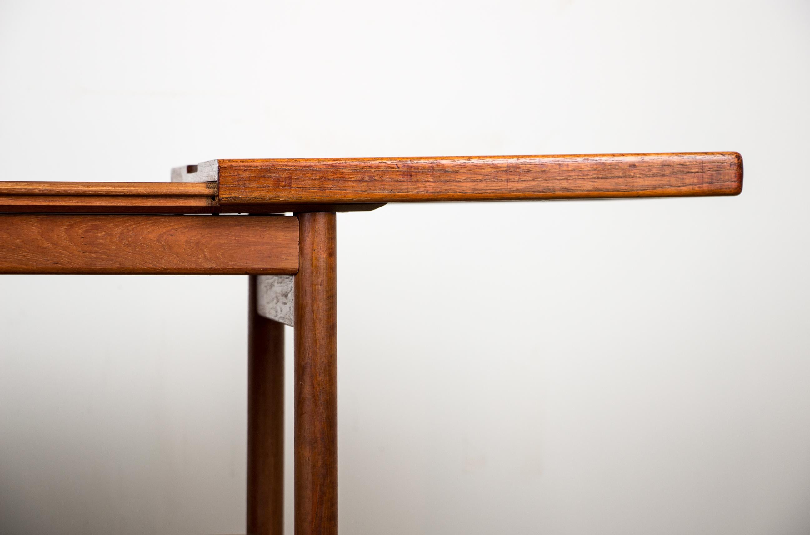 Mid-20th Century Extendable Danish rolling table with two levels, in teak, 1960 by Kurt Ostervig For Sale