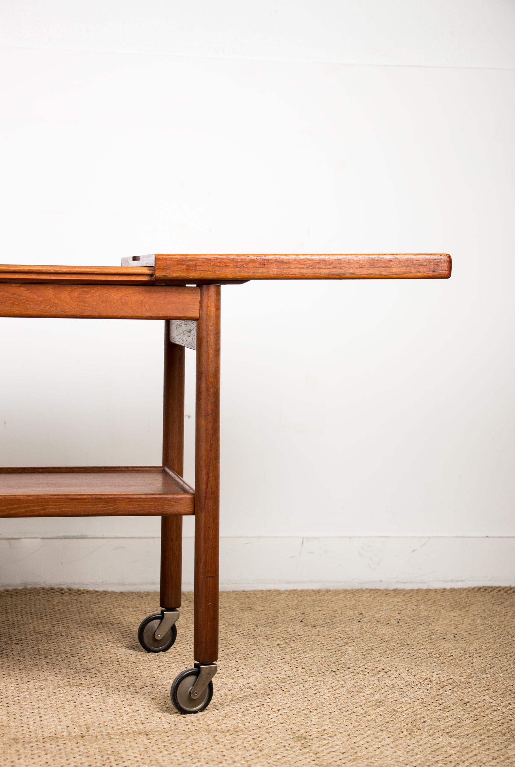 Formica Extendable Danish rolling table with two levels, in teak, 1960 by Kurt Ostervig For Sale