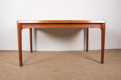 Extendable Danish teak dining table by Henning Kjaernulf for Vejle Stole 1960.