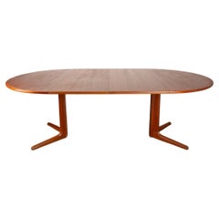 Tavolo da pranzo danese allungabile in teak con piedistallo centrale, di Niels Moller 1960.