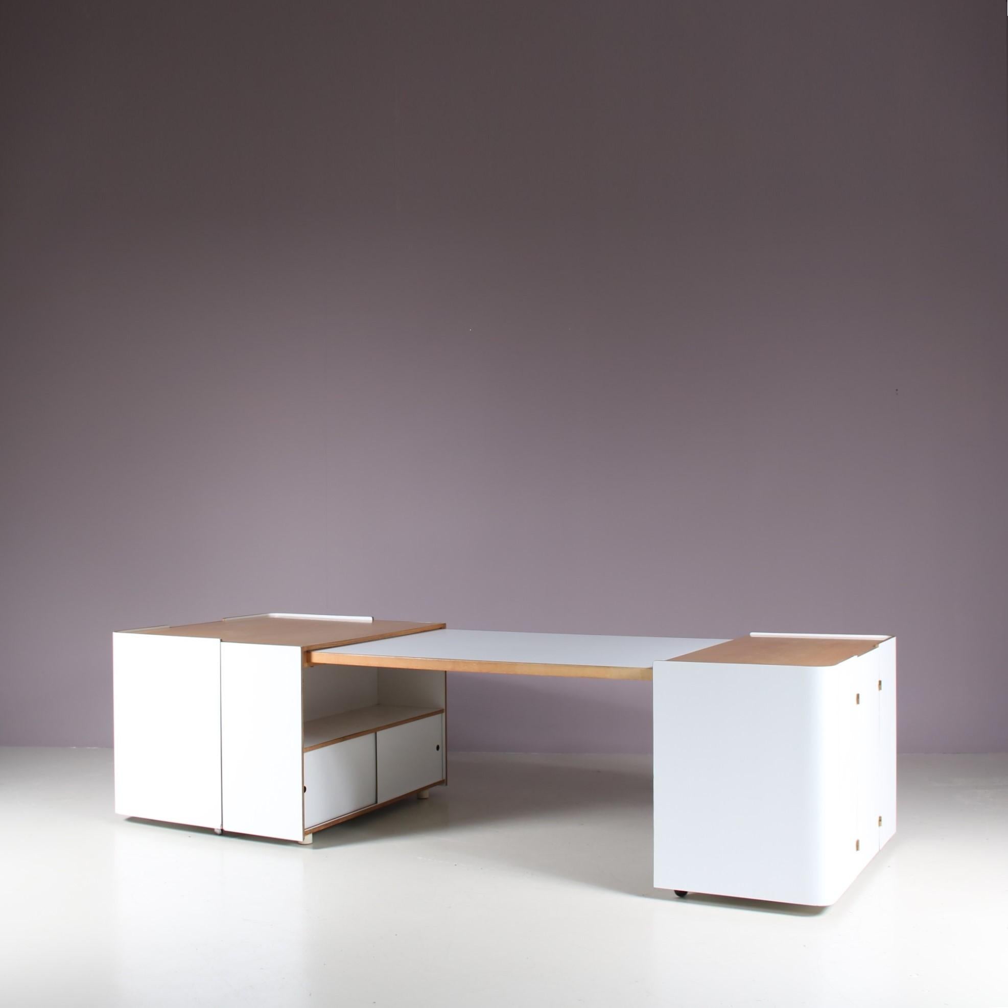A unique extendible cabinet / desk, designed by Roberto Pamio, Renato Toso & Noti Massari, manufactured by Stilwood in Italy around 1970.

This eye-catching piece is made of beautiful quality wood with white laminated panels, giving it a really nice