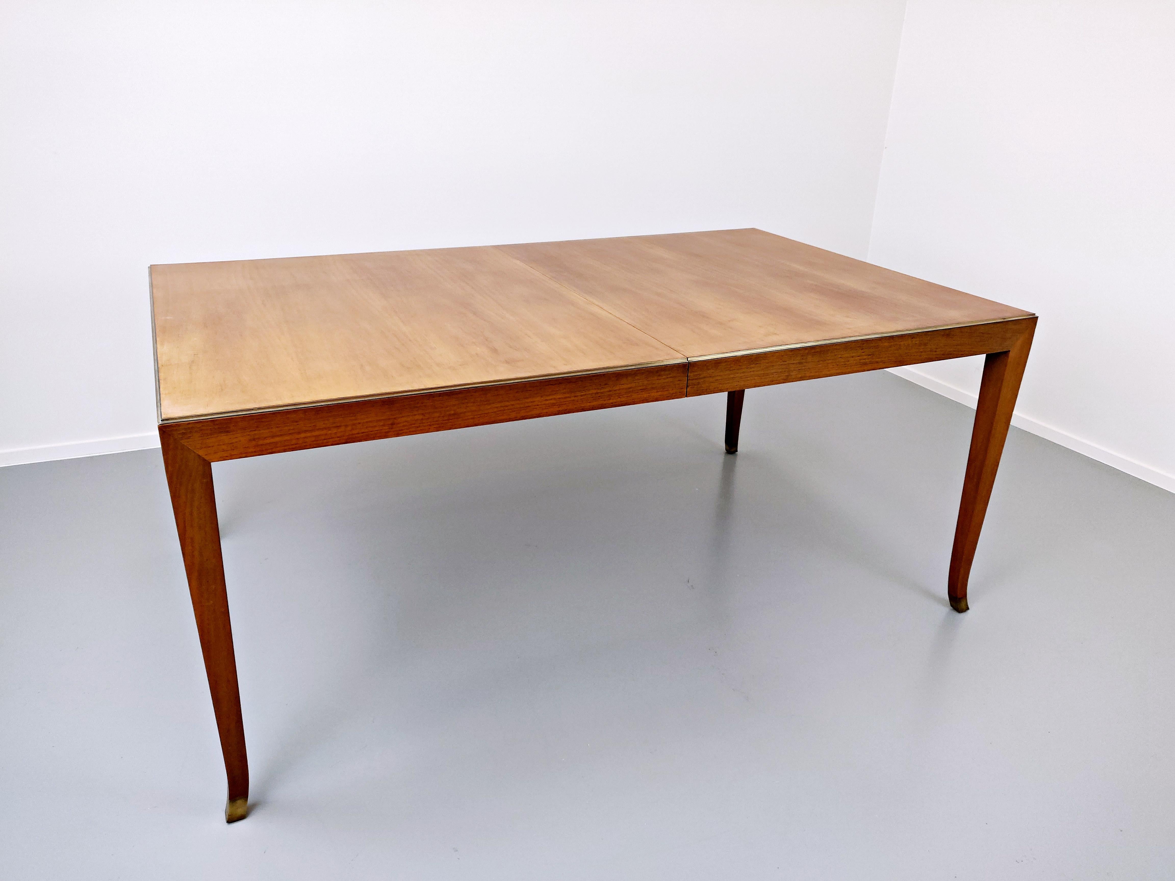 Extendable dining table by T.H. Robsjohn-Gibbings for Saridis.