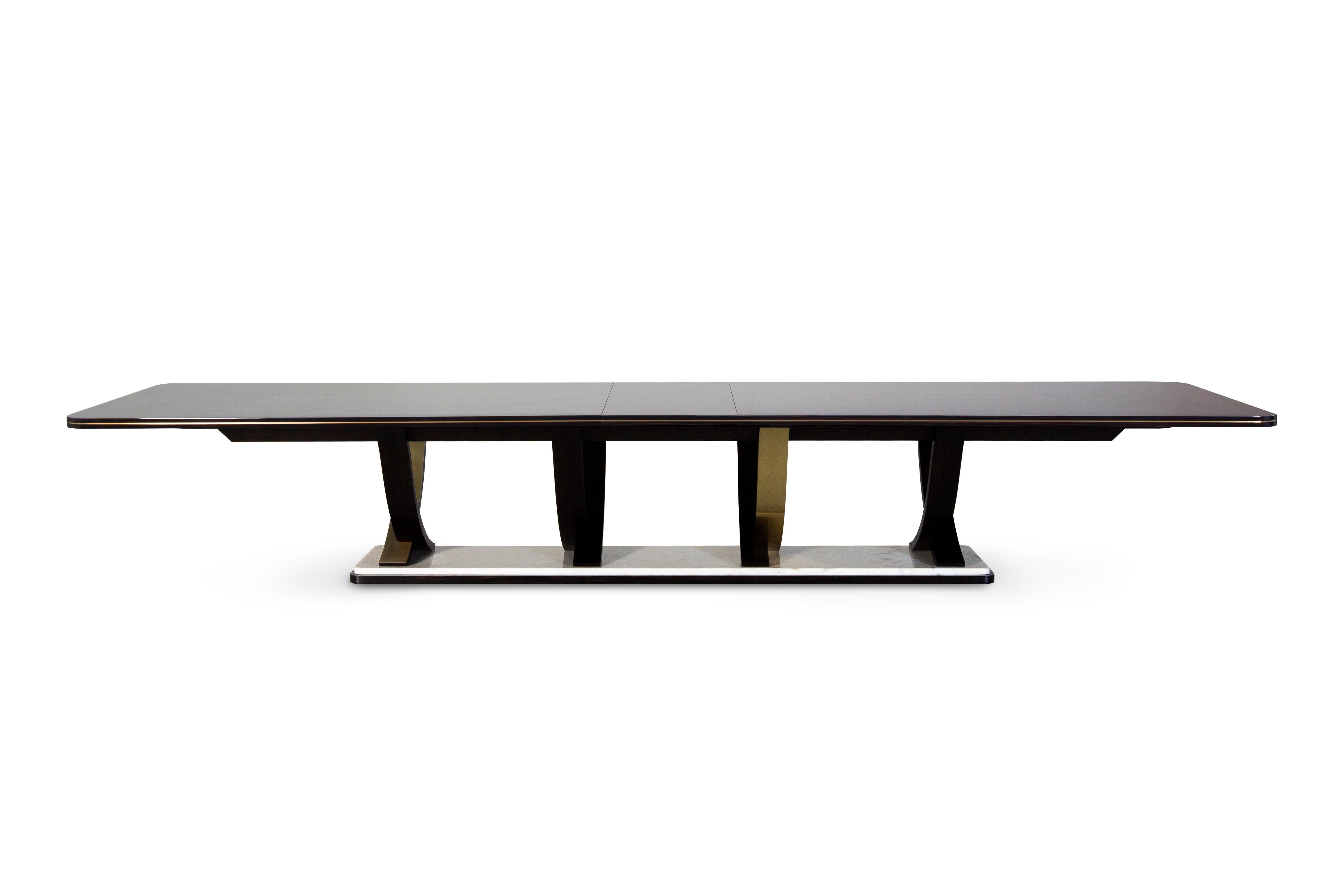 Extendable dining table fontaine by Green Apple
Dimensions: H 75 x W 400 x D 120 cm
Materials: ebony veneer, brass, beech, marble.

Extendable dining table top in Macassar ebony veneer with inlaid edging in brushed brass, both with high-gloss