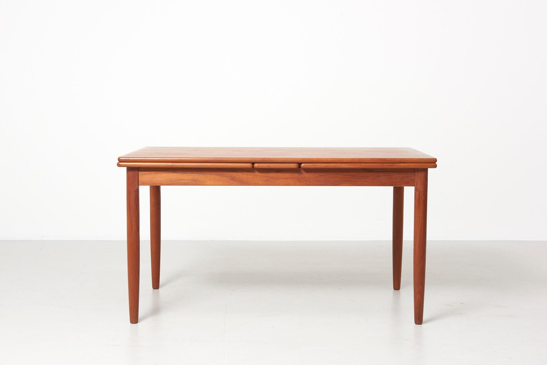 Extendable Dining Table with Two PullOut Leaves at 1stDibs table