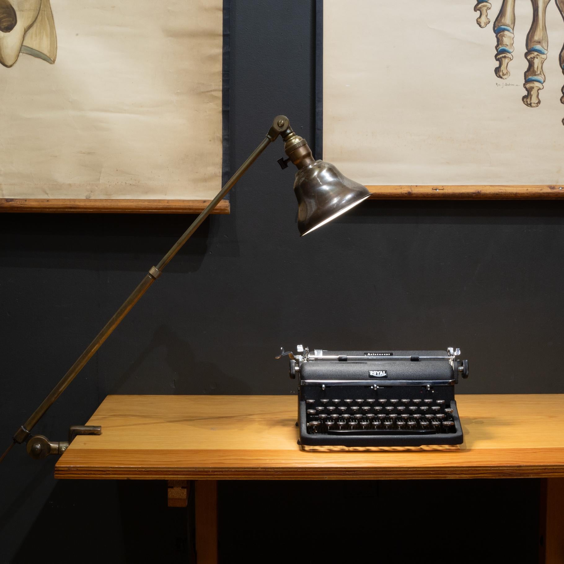 ABOUT

Antique clamp-on industrial task lamp with sliding telescopic arm and adjustable head. Original on-off switch to head.

    CREATOR Micron Machine Corp, USA. 
    DATE OF MANUFACTURE c.1930-1940. 
    MATERIALS AND TECHNIQUES Solid Bronze,