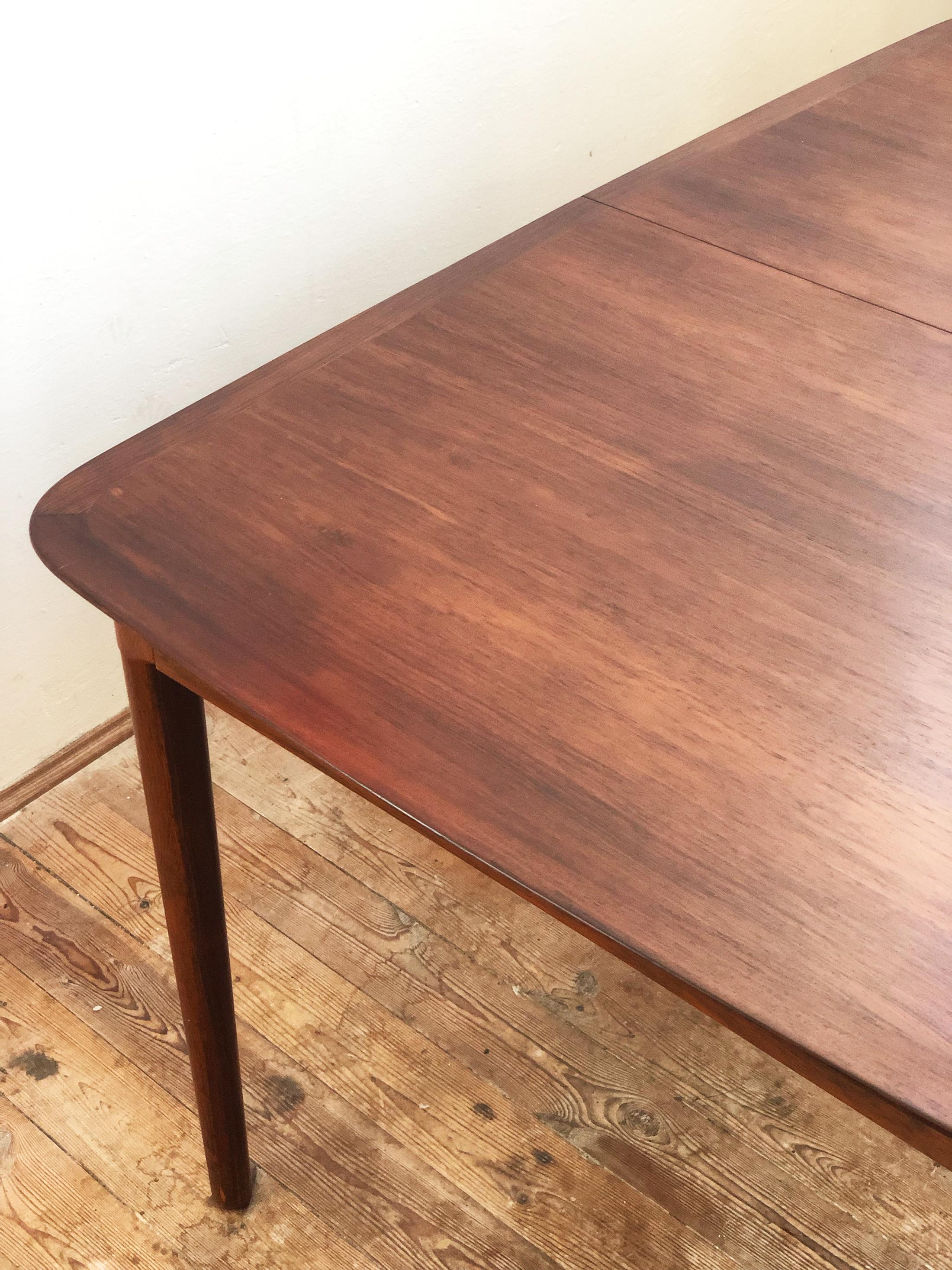 Extendable Midcentury Rosewood Dining Table with Fold-Out Leaves by Lübke For Sale 8