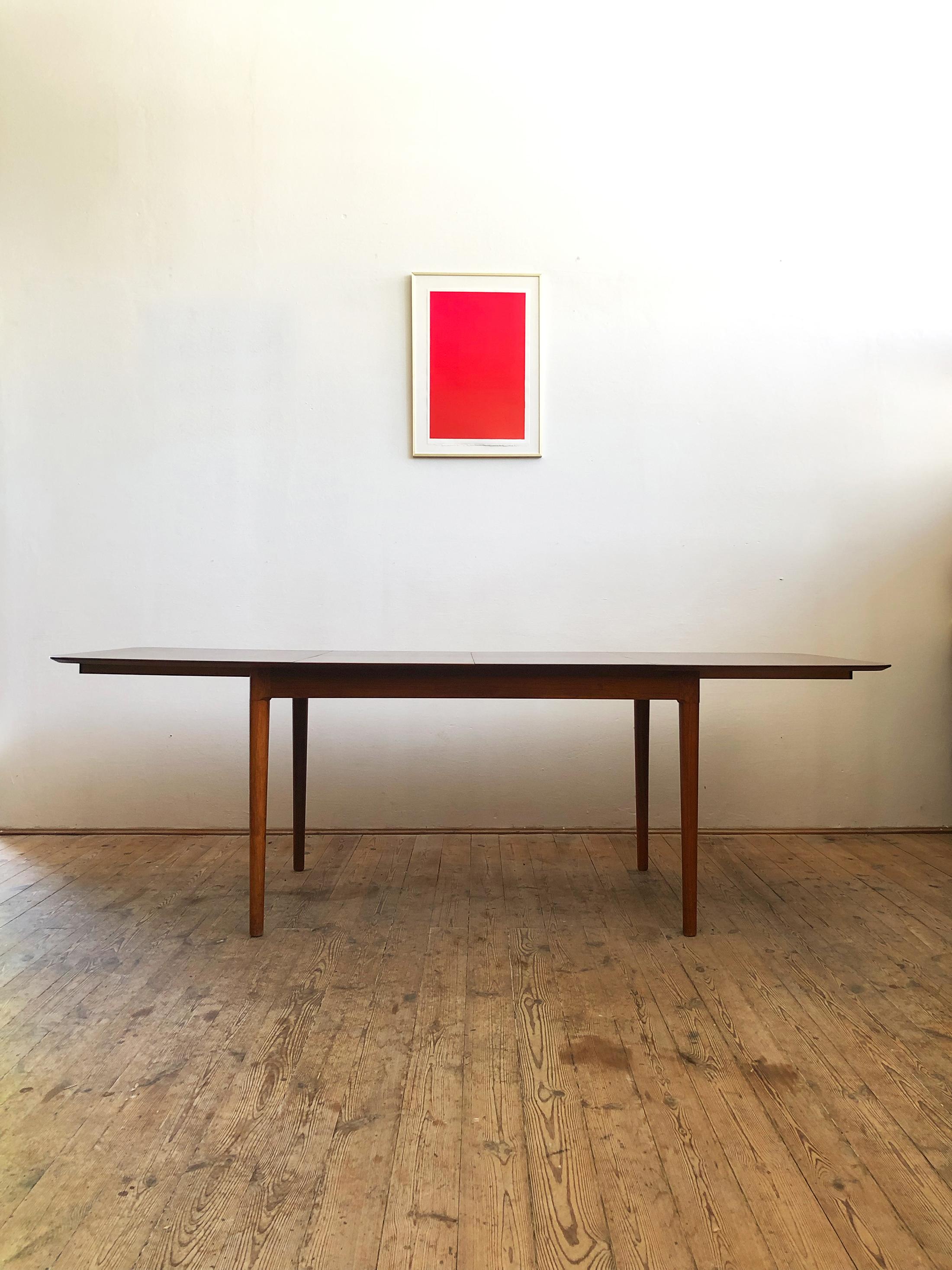 Danish Extendable Midcentury Rosewood Dining Table with Fold-Out Leaves by Lübke For Sale