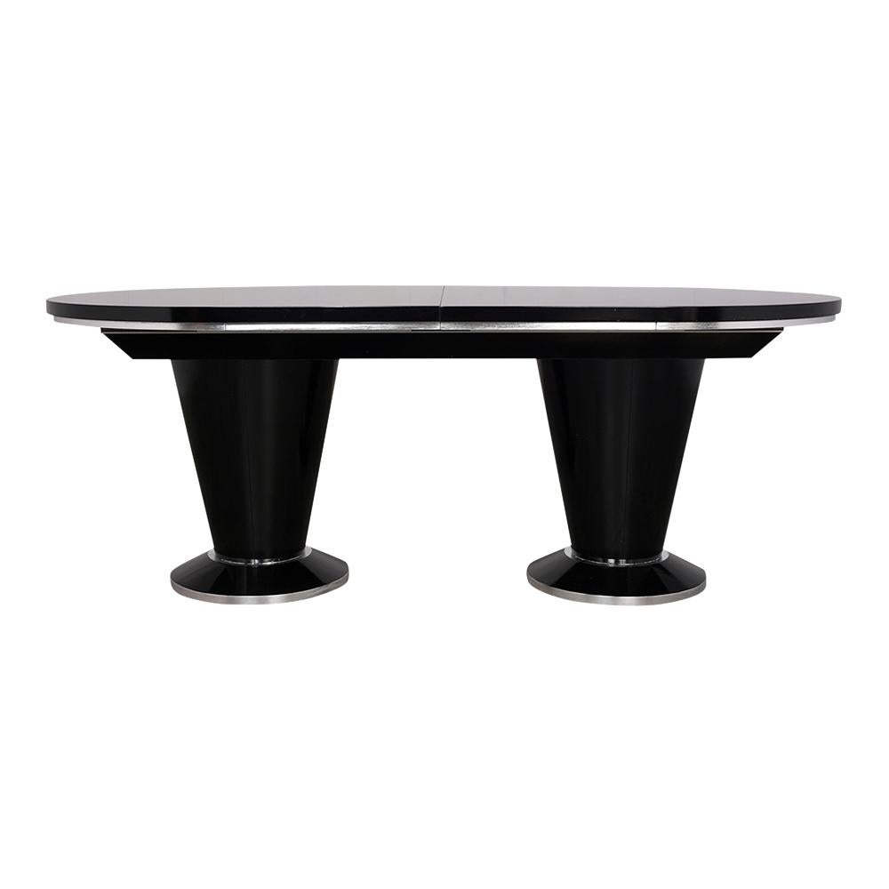 This Vintage Mid Century Modern Extendable Dining Table has been newly restored, made out of solid wood, and stained a rich black & silver color combination with a newly lacquered finish. This Oval Conference Table features an additional leaf that