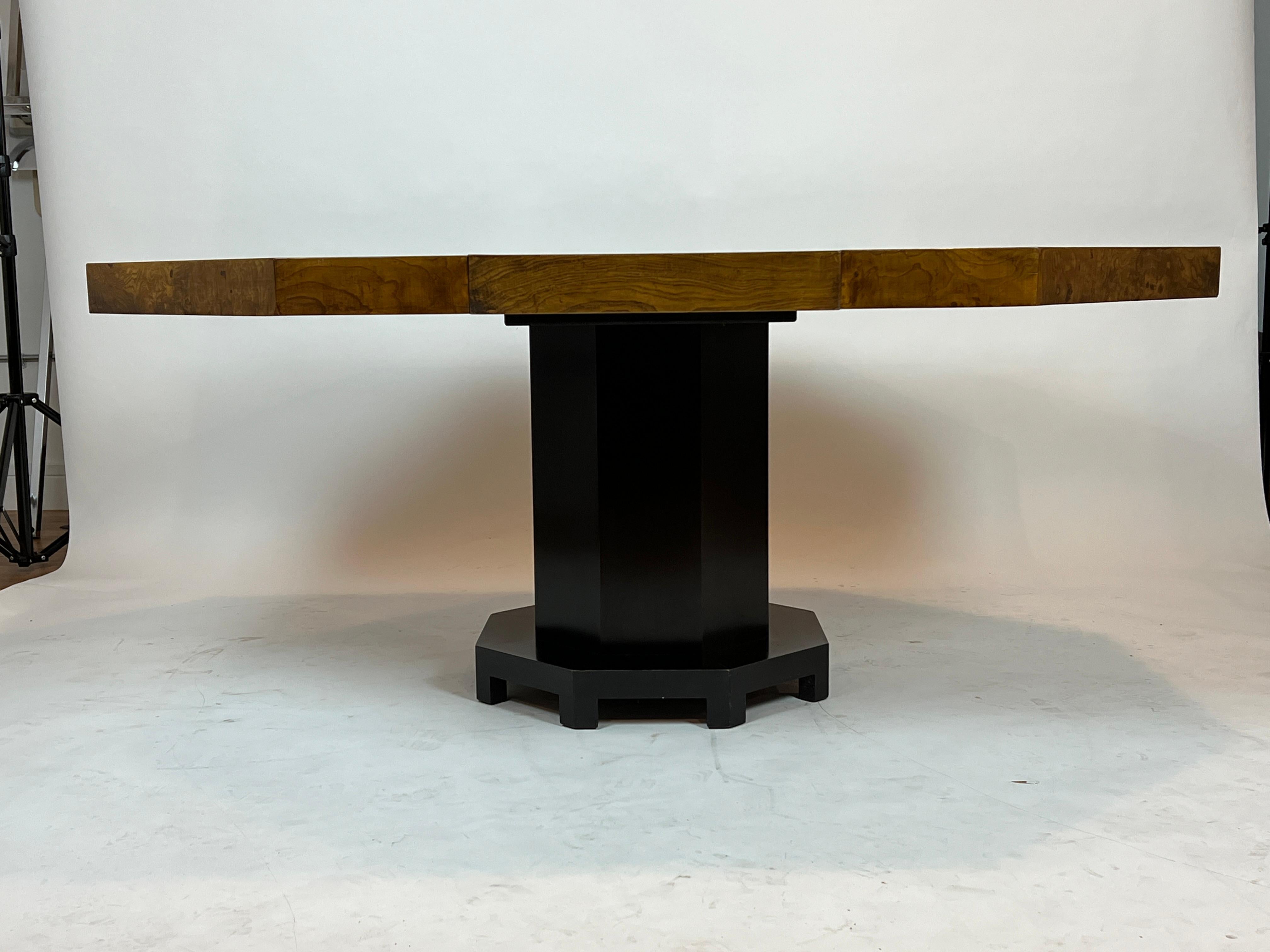 Octagon shape mid-century burl wood expandable dining or game table attributed to Harvey Probber. This sturdy and well made table opens up to extend up to 64