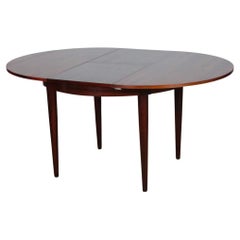 Extendable rosewood dining table in Rio, 1960