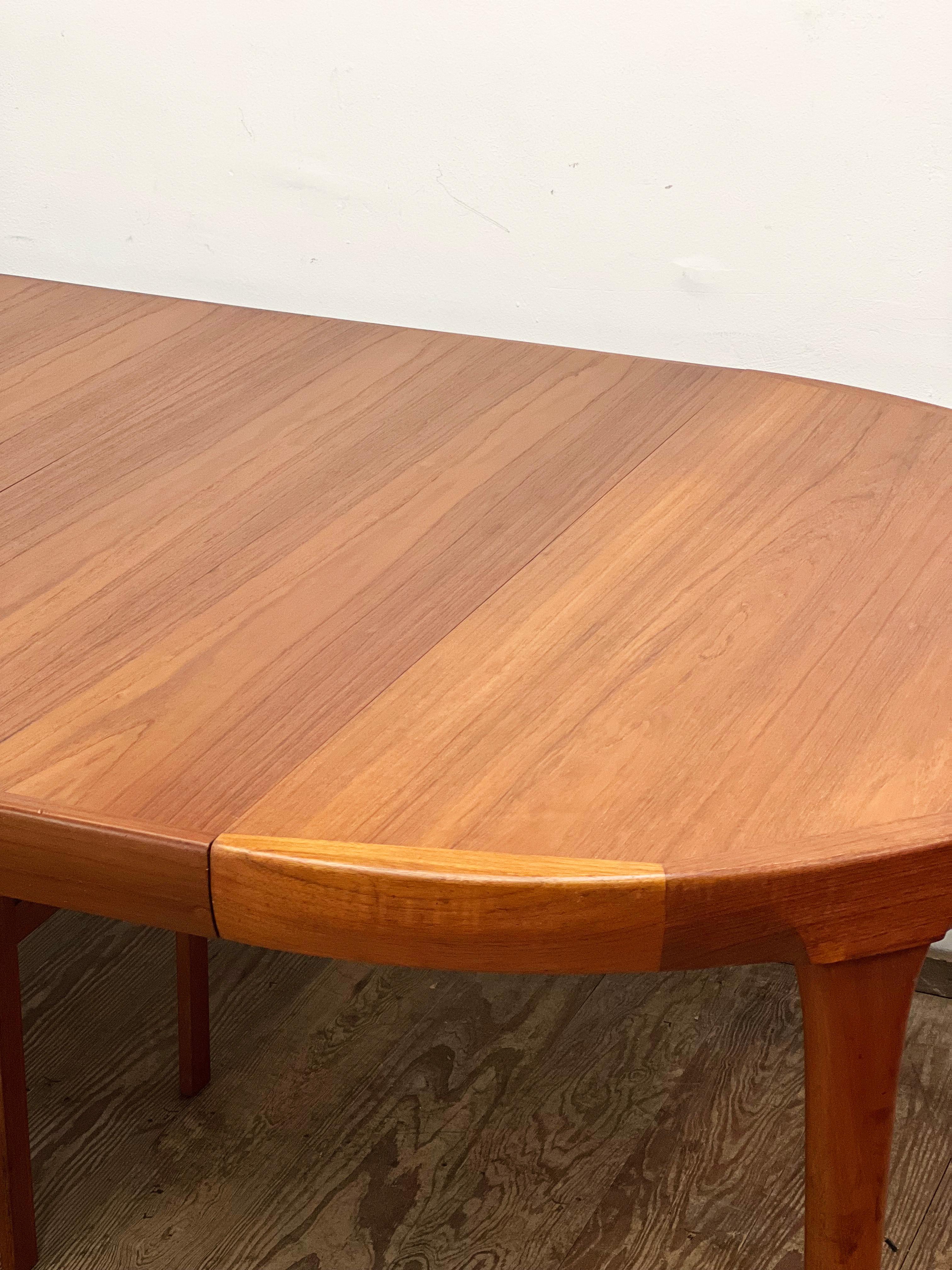 Extendable Round Mid-Century Teak Dining Table by Ib Kofod-Larsen for Faarup 10