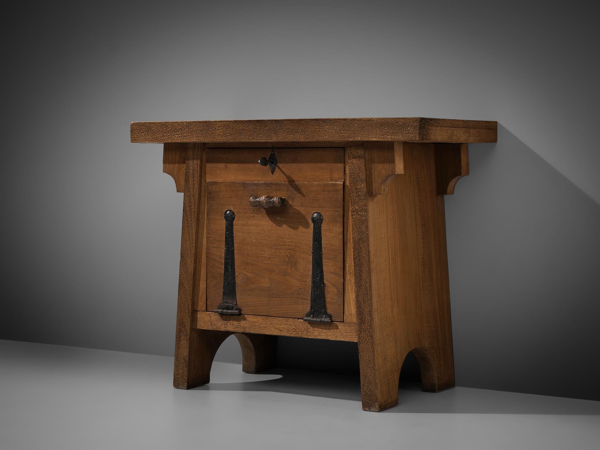 Ernesto Valabrega, side cabinet, oak, iron, Italy, circa 1935

Small cabinet designed by Ernesto Valabrega, circa 1935. This cabinet holds every aspect of a true Valabrega design: handcrafted, sturdy and unique. Its almost trapezoid overall shape is