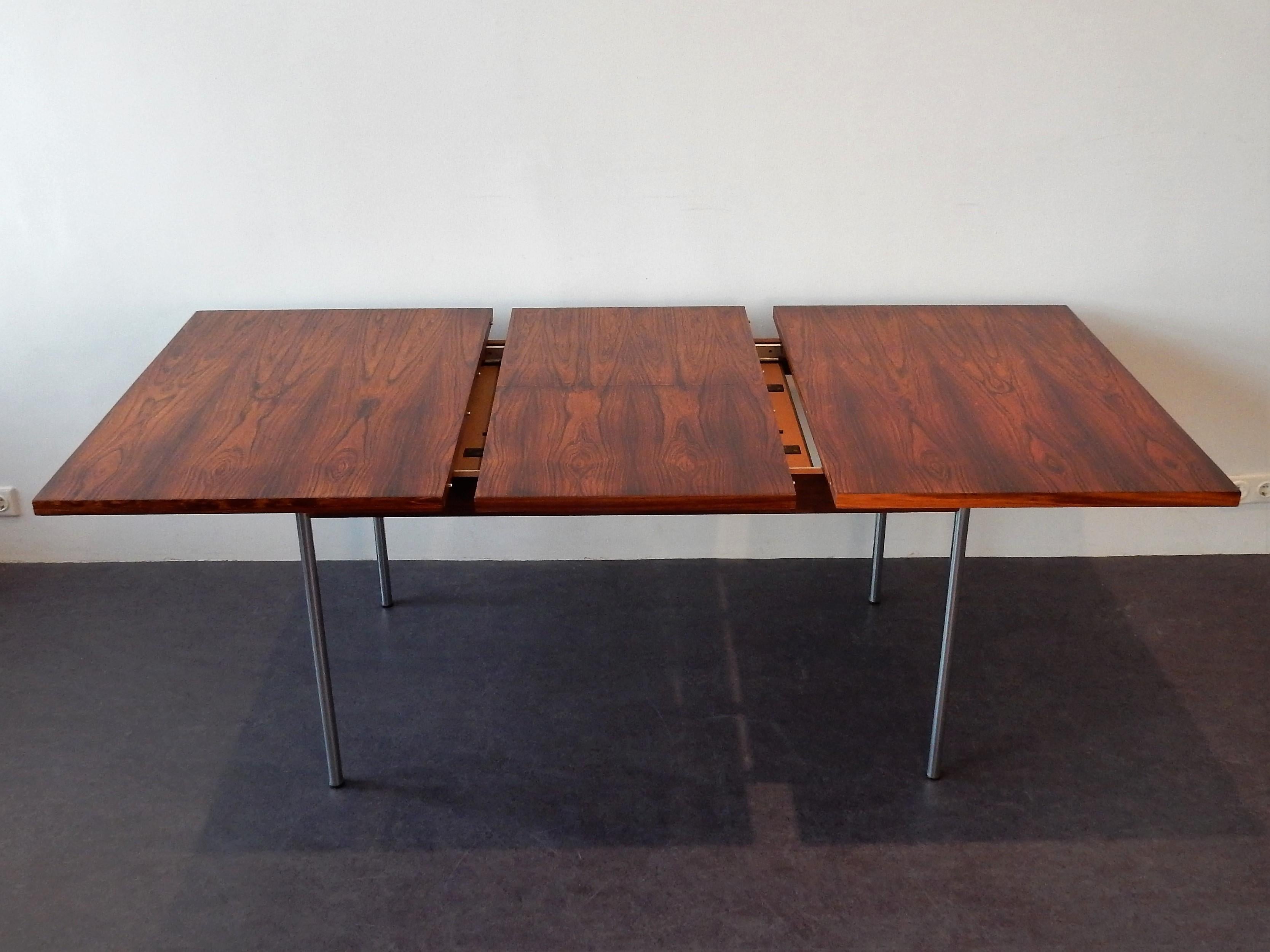 Beautiful rosewood veneered top dining table. A design by Cees Braakman for Pastoe from the 1960s. When we sourced this table it did have some smaller pieces of veneer missing. This has been professionally restored by our restorer. The extension