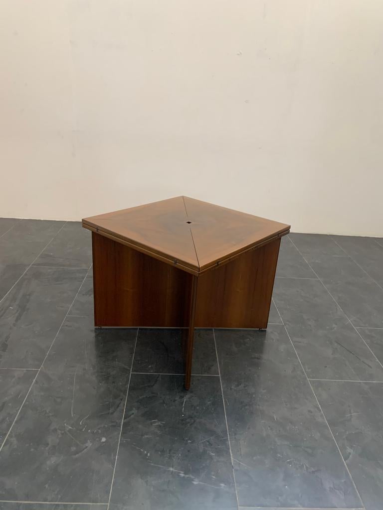 Extendable Table with Overwhelming Envelope Openings attributed to Vittorio Introini for Luigi Sormani, 1970s.
(Piece attributed to the above designer/maker. It has no hallmark or proof of authenticity, but is documented in design history.)
Made of